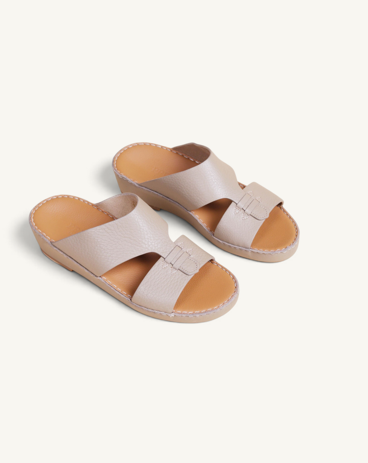 Prestige P3306 Elegance Trotter Sharon beige leather slide sandals with a comfortable wedge heel and stitched detail.