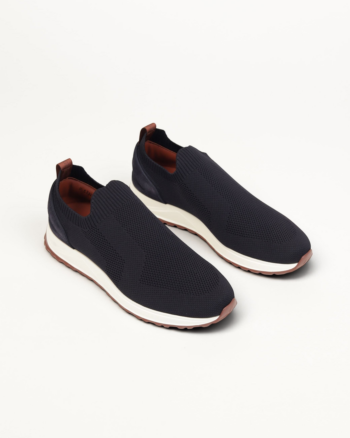 Prestige XLR Maverick active slip-on sneakers in black knit fabric with white midsole and brown leather heel tab