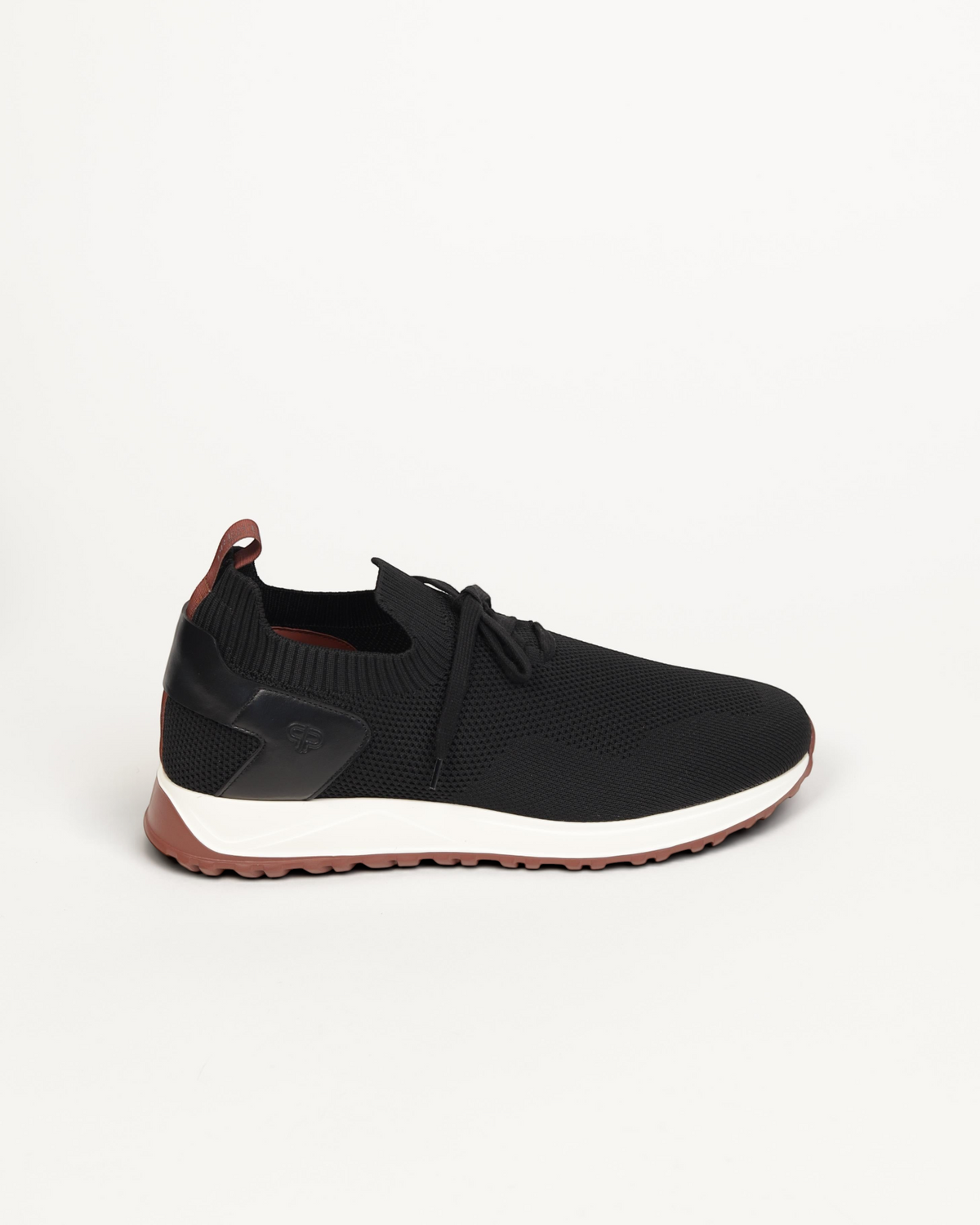 Prestige XLR FAME WALK XL LUX black knit sneaker with a white midsole and maroon heel tab detail.