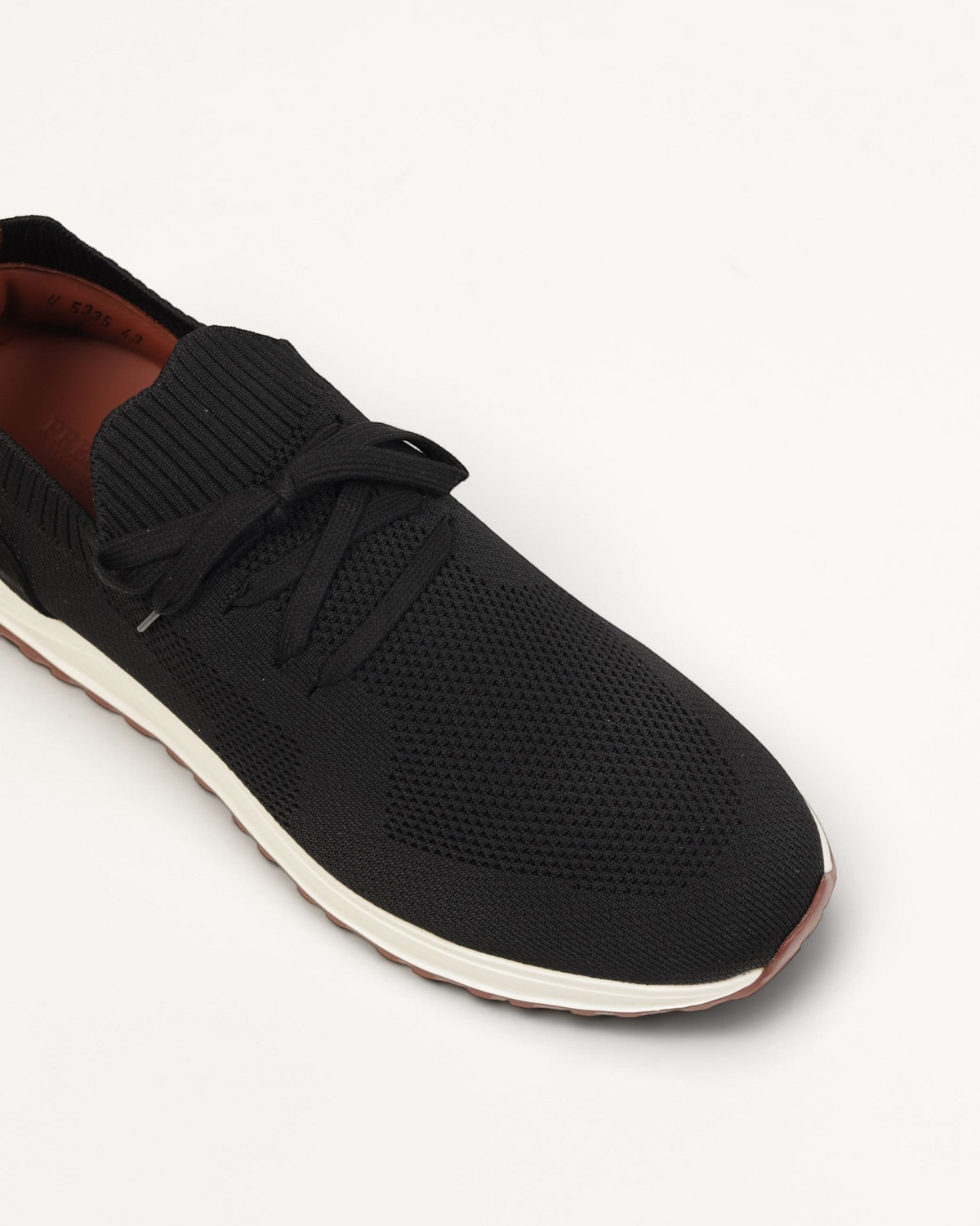 Prestige XLR Maverick Walk XL Lux black knit sneaker with a white midsole and brown rubber outsole