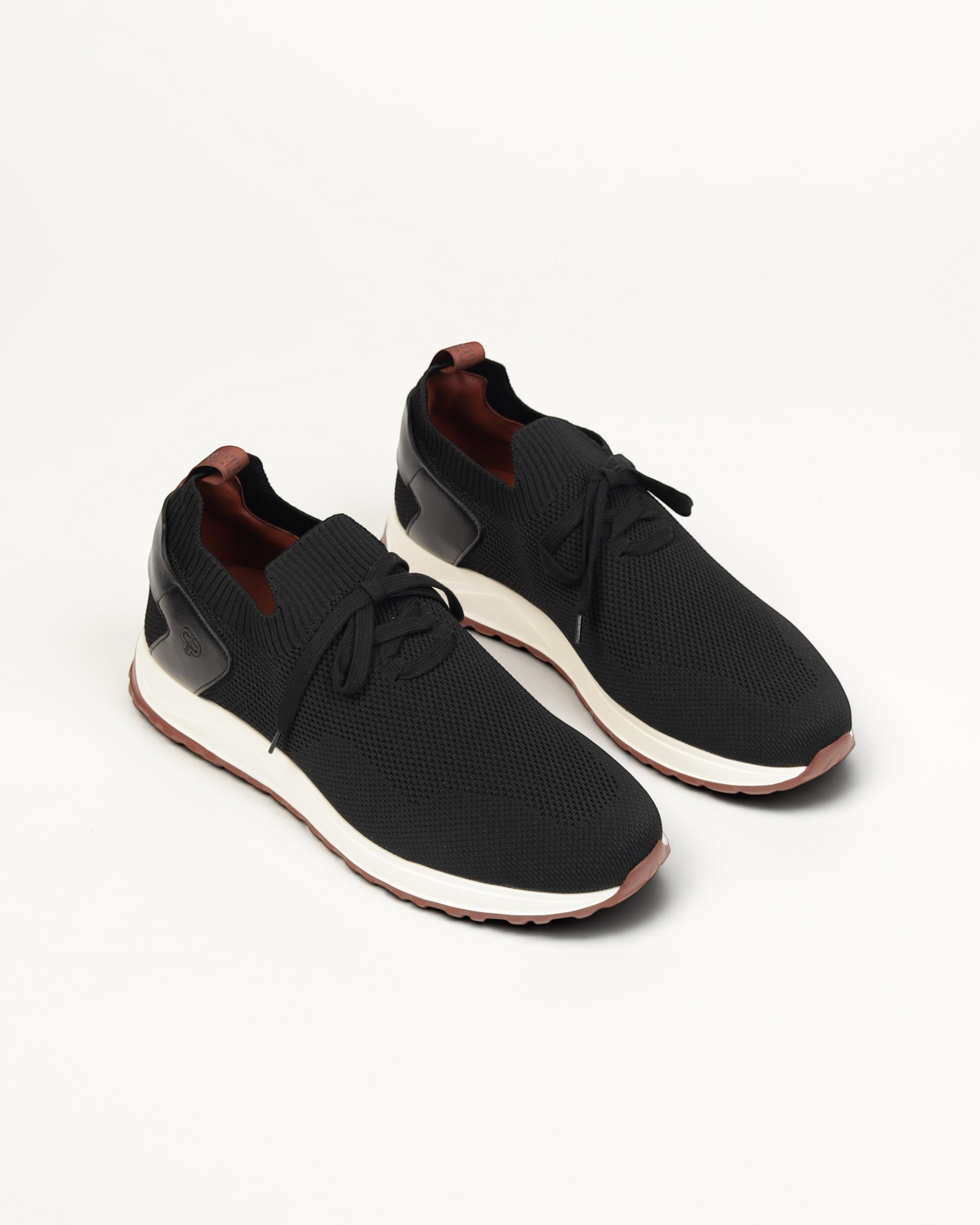 Prestige XLR Fame Walk XL Lux black sneakers featuring a breathable knit upper and a comfortable white rubber sole.