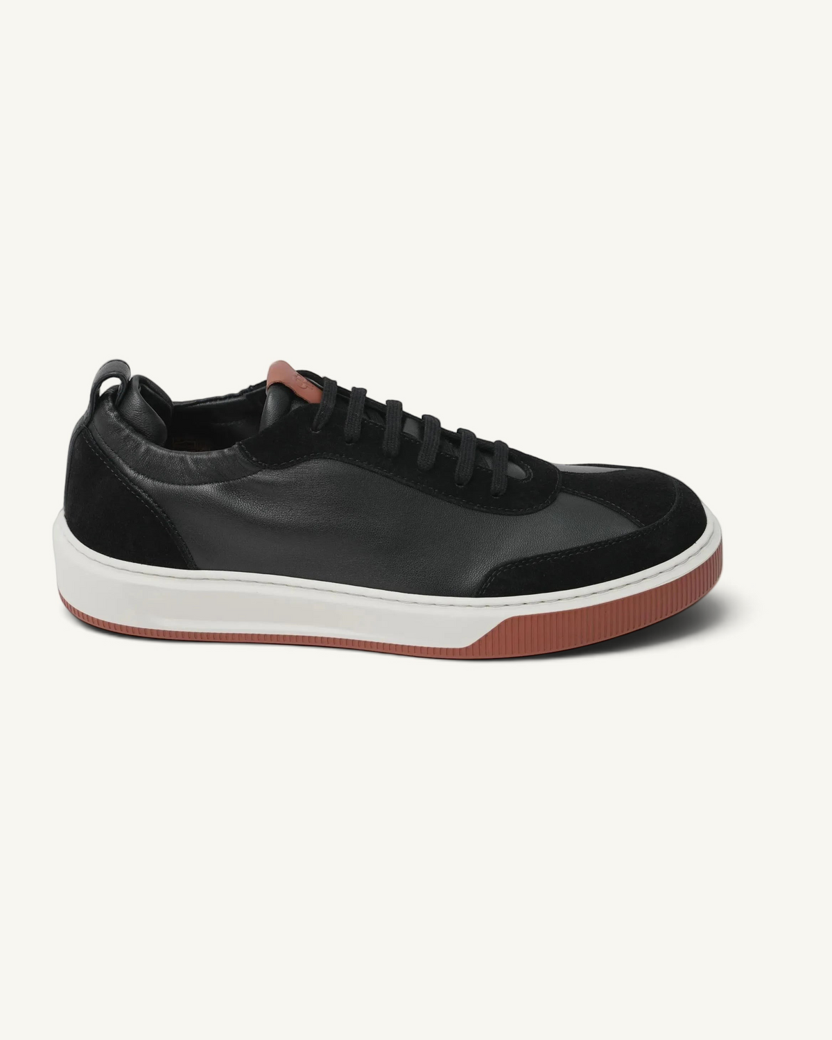 Prestige Legacy Walk Reverse men's black leather and suede sneaker with a white midsole and brown rubber outsole.