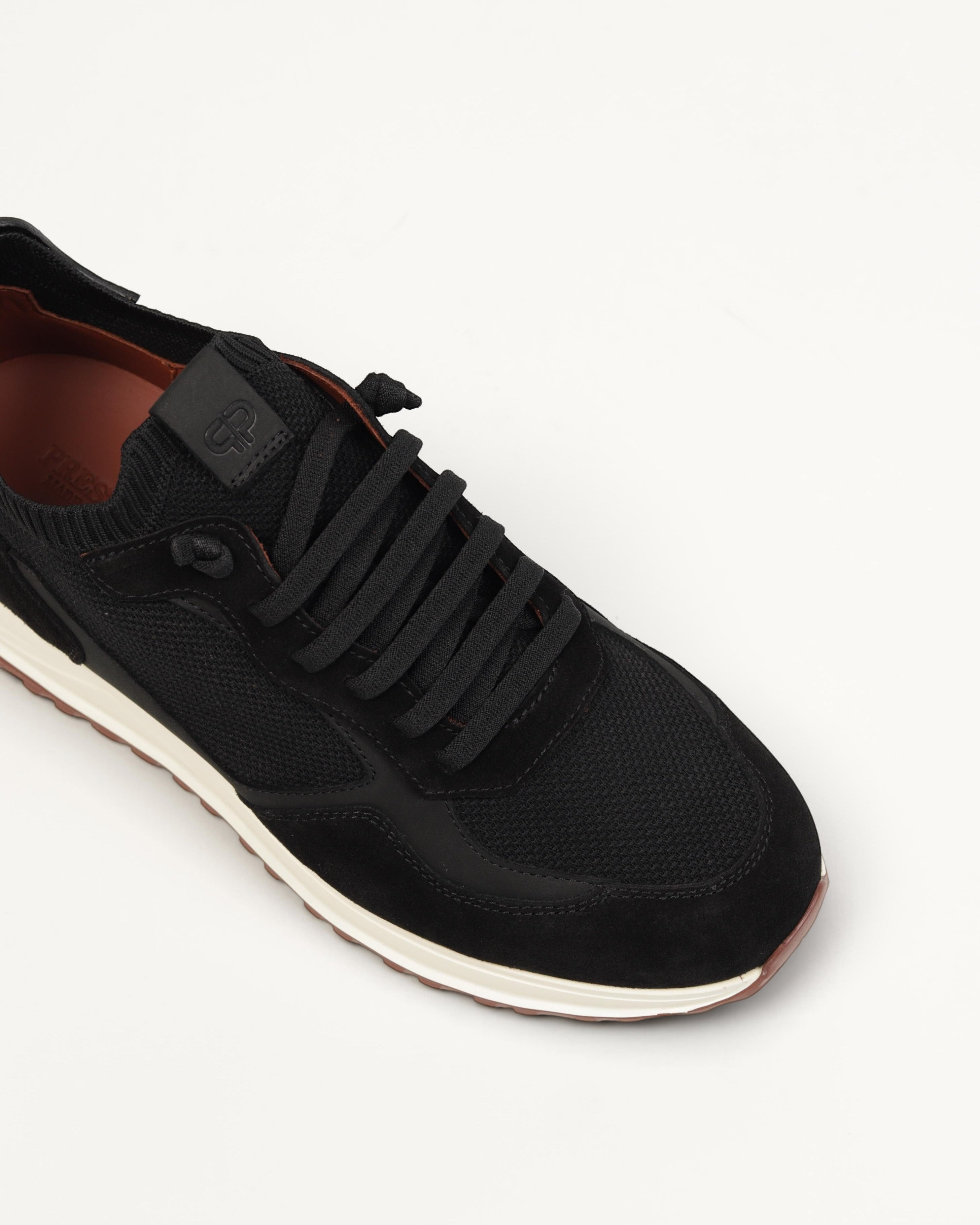 Prestige XLR Stars Walk XL Lux black sneaker featuring a mesh and suede upper with a white midsole and brown lining.