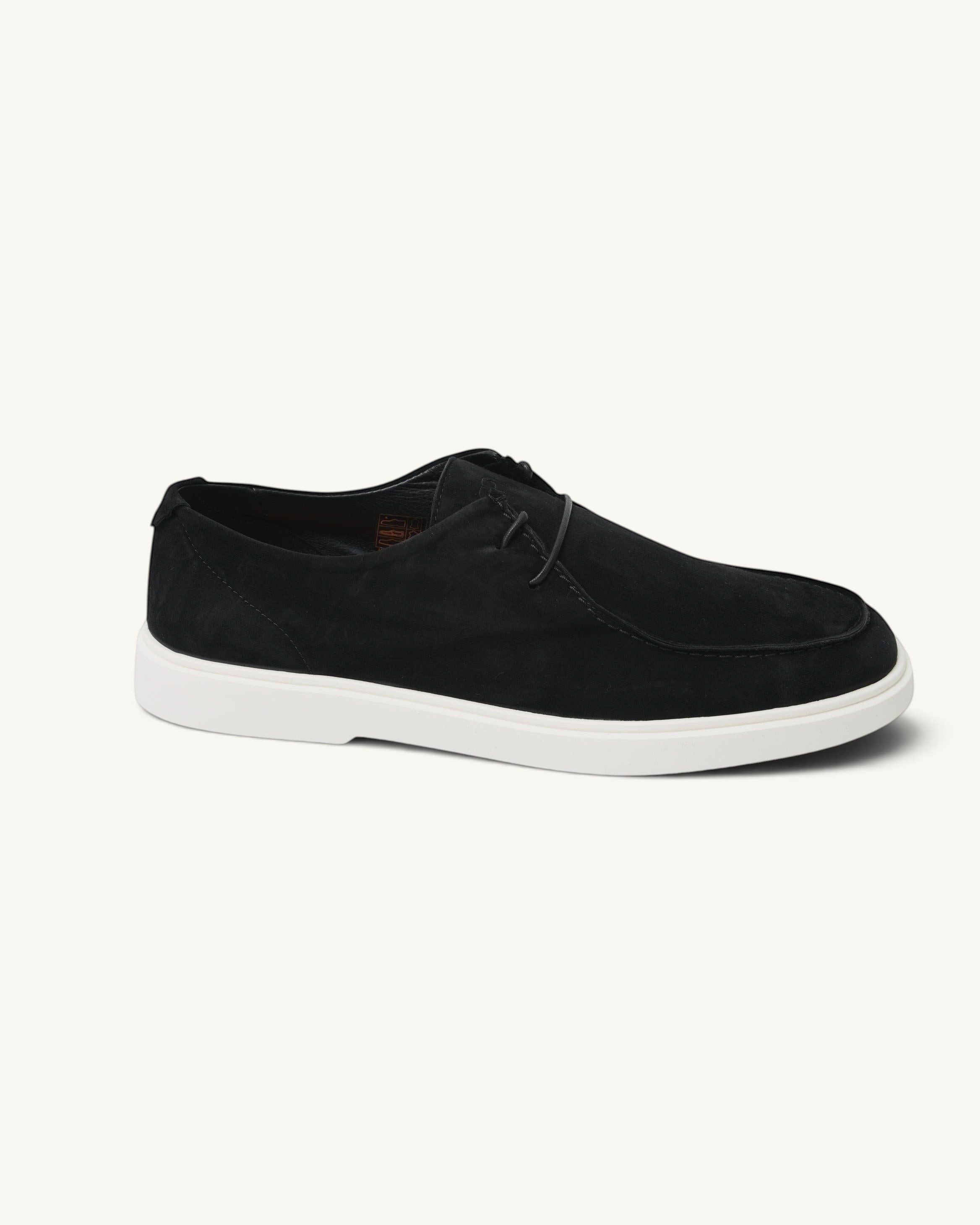 Prestige Playtime Reverse men's black suede loafer with a white rubber sole and minimalist lace-up detail