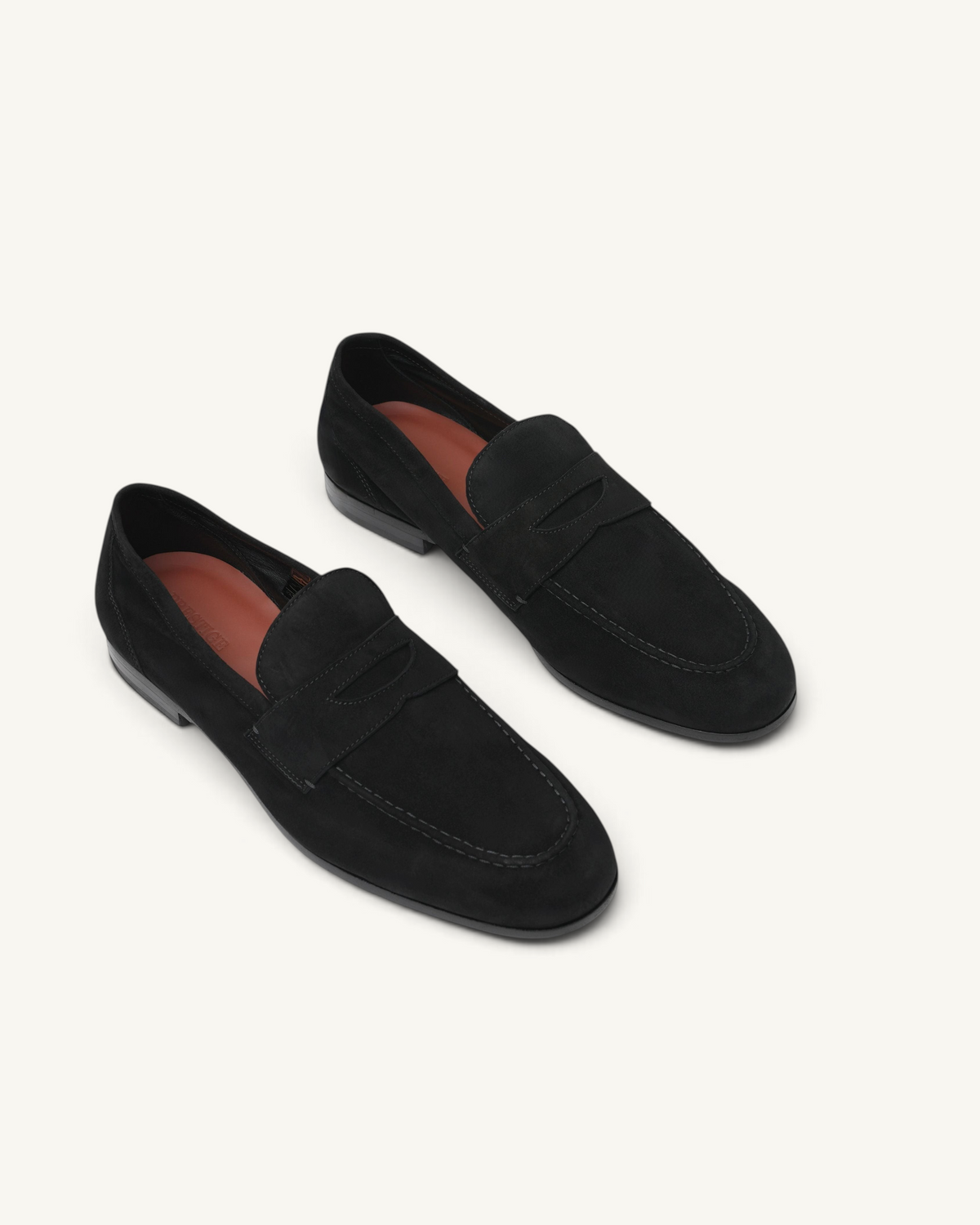 Prestige men's black suede classic reverse penny loafers with a sleek slip-on design and tan leather interior lining.