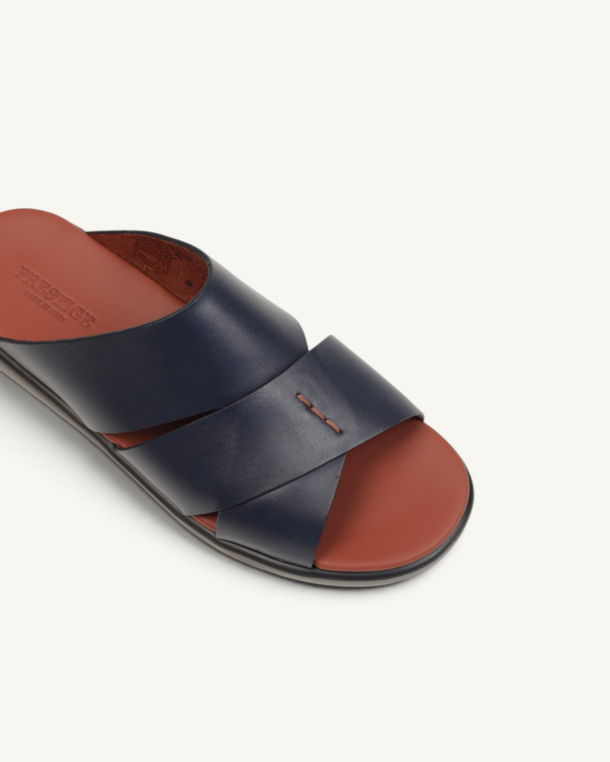Prestige P3437 PALM LUX slide sandals in blue napa calf leather with a brown footbed and cross-strap design.