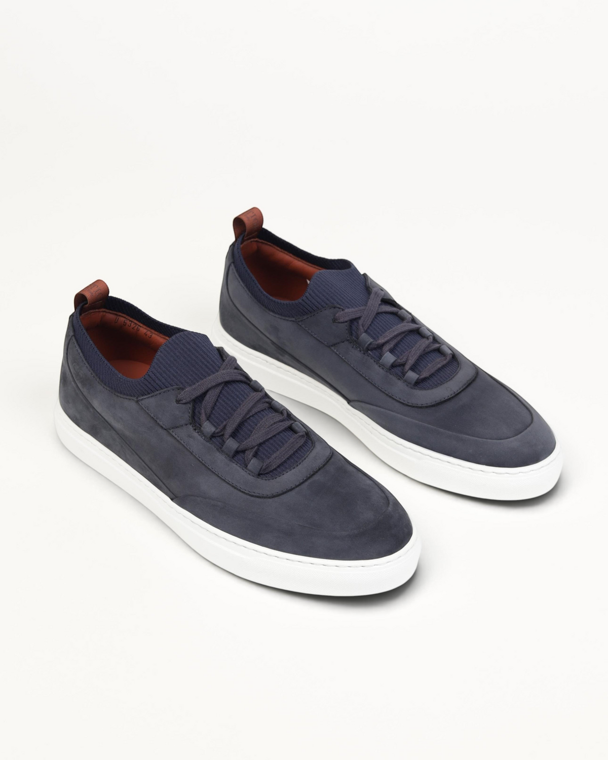 Prestige U5326 Soho blue nubuck leather sneakers with a lightweight white rubber sole and dark blue knit collar.
