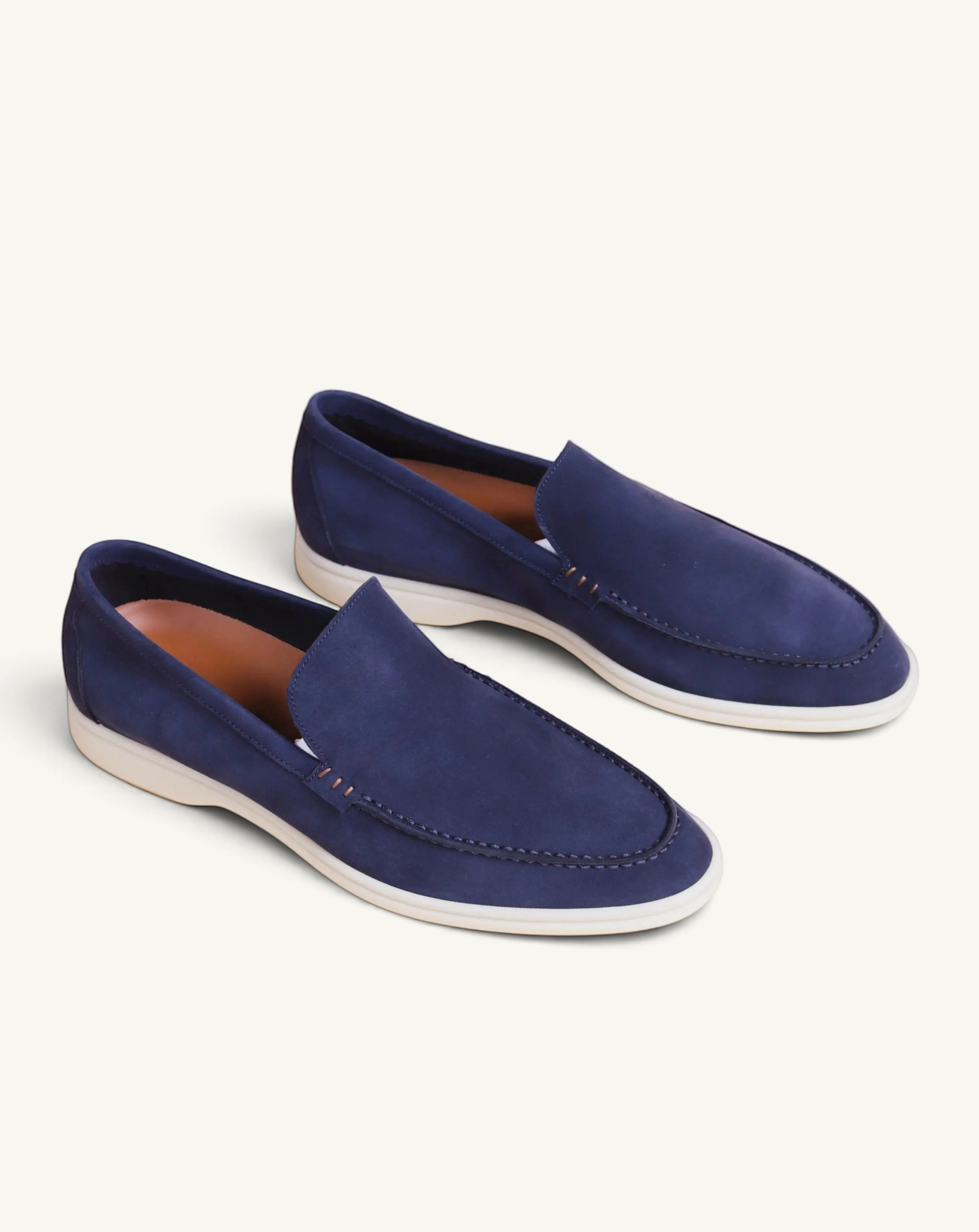 Prestige blue suede loafer walk shoes with a white rubber sole and stitched detailing