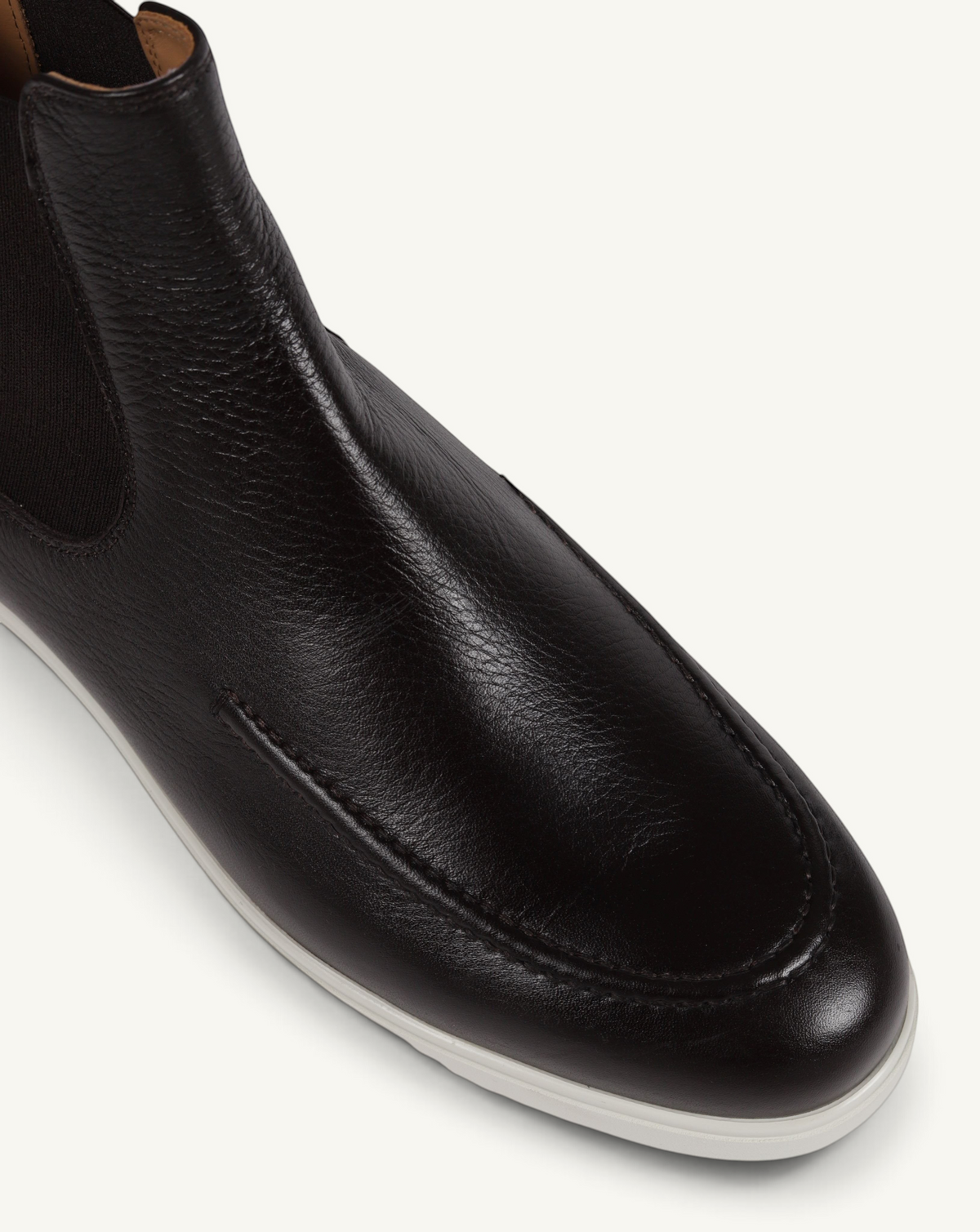 Prestige brown grain deer leather Chelsea boot with a moc-toe design and a white rubber sole