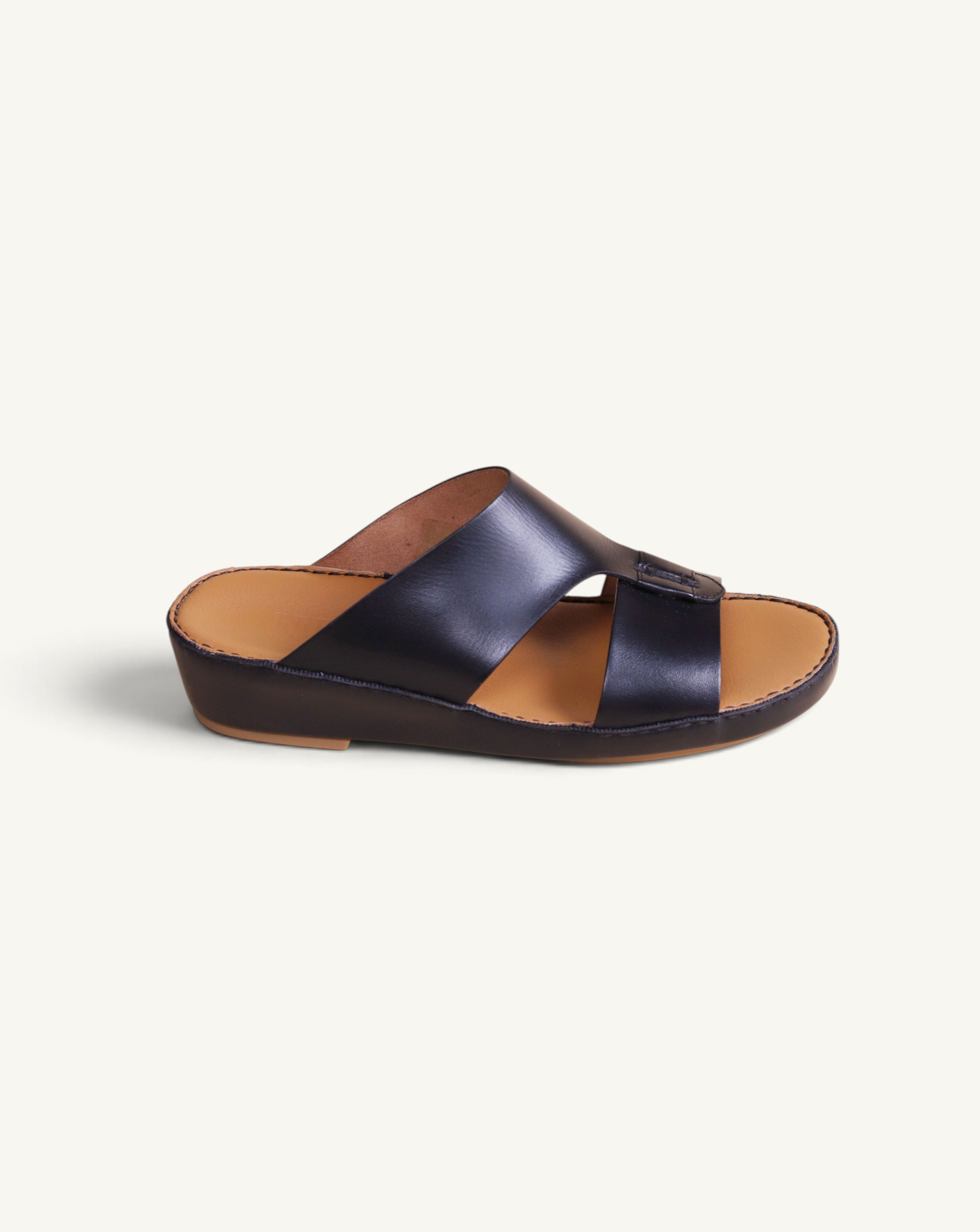 Prestige Caesar Goteborg black nappa leather slide sandals with a comfortable tan footbed and buckle detail