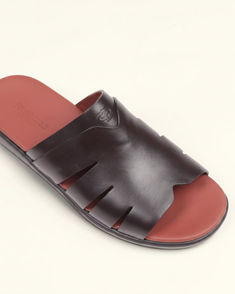 Prestige dark brown soft nappa calf leather slide sandals with a rust-colored footbed and cutout design