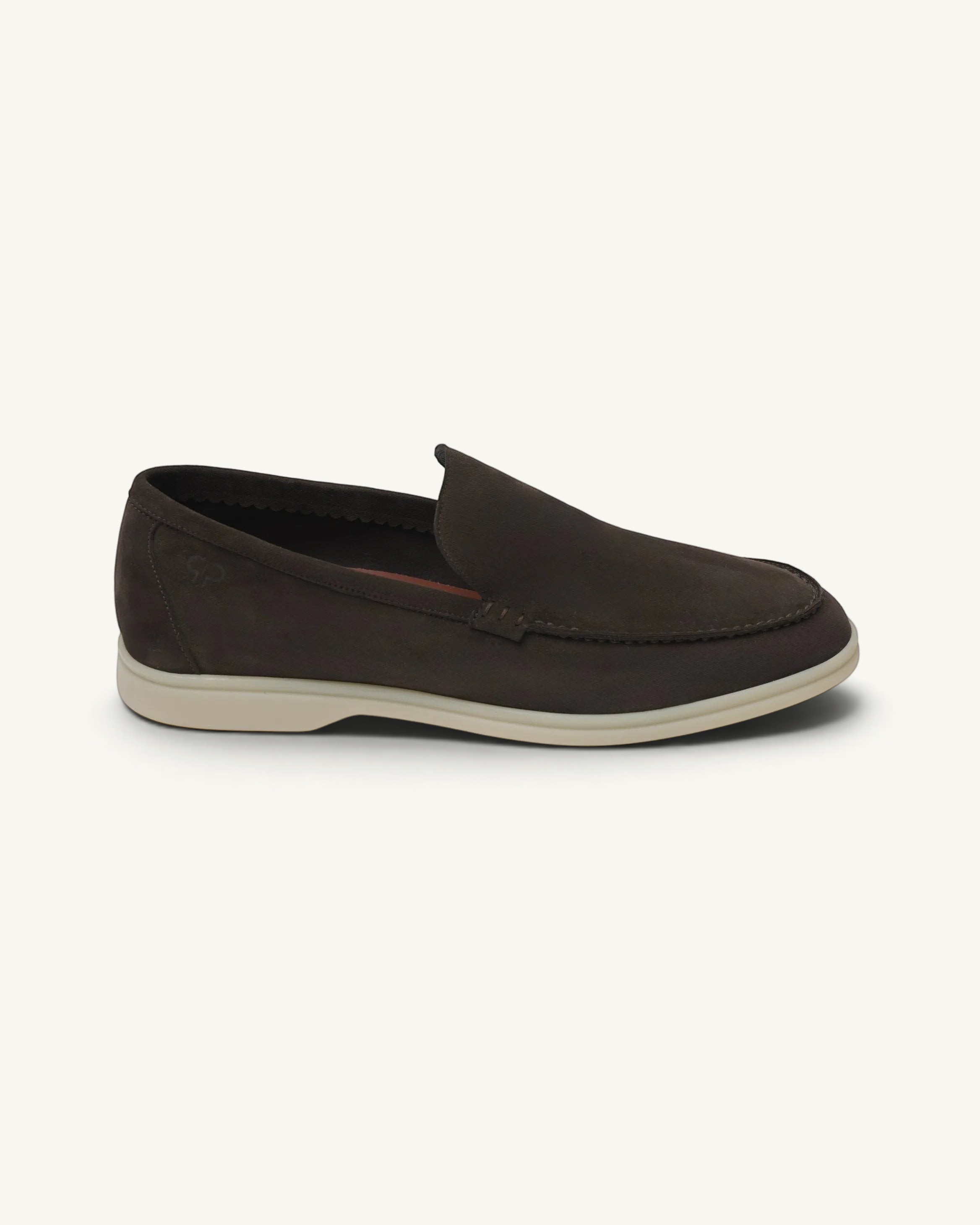 Prestige dark brown suede loafer with a white rubber sole and minimalist slip-on design