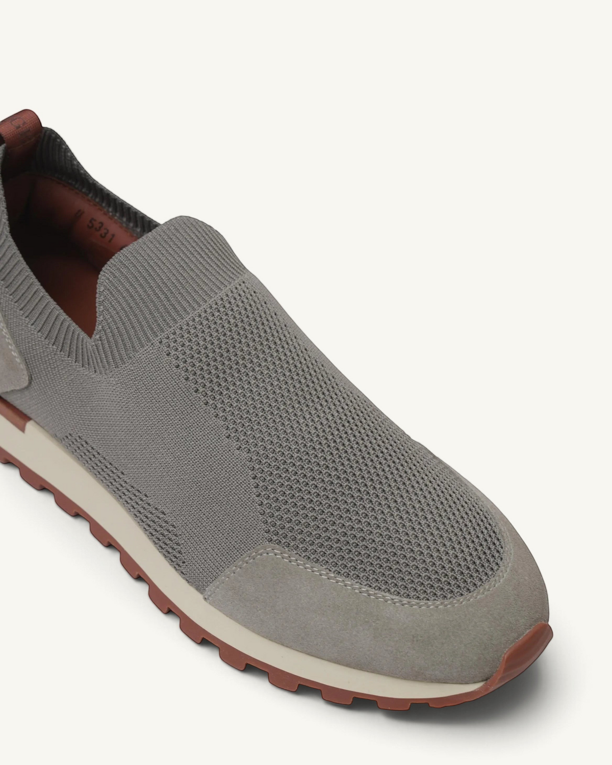 Prestige Flexy Lux active runners in dark grey knit fabric with suede detailing and a contrasting rubber sole.