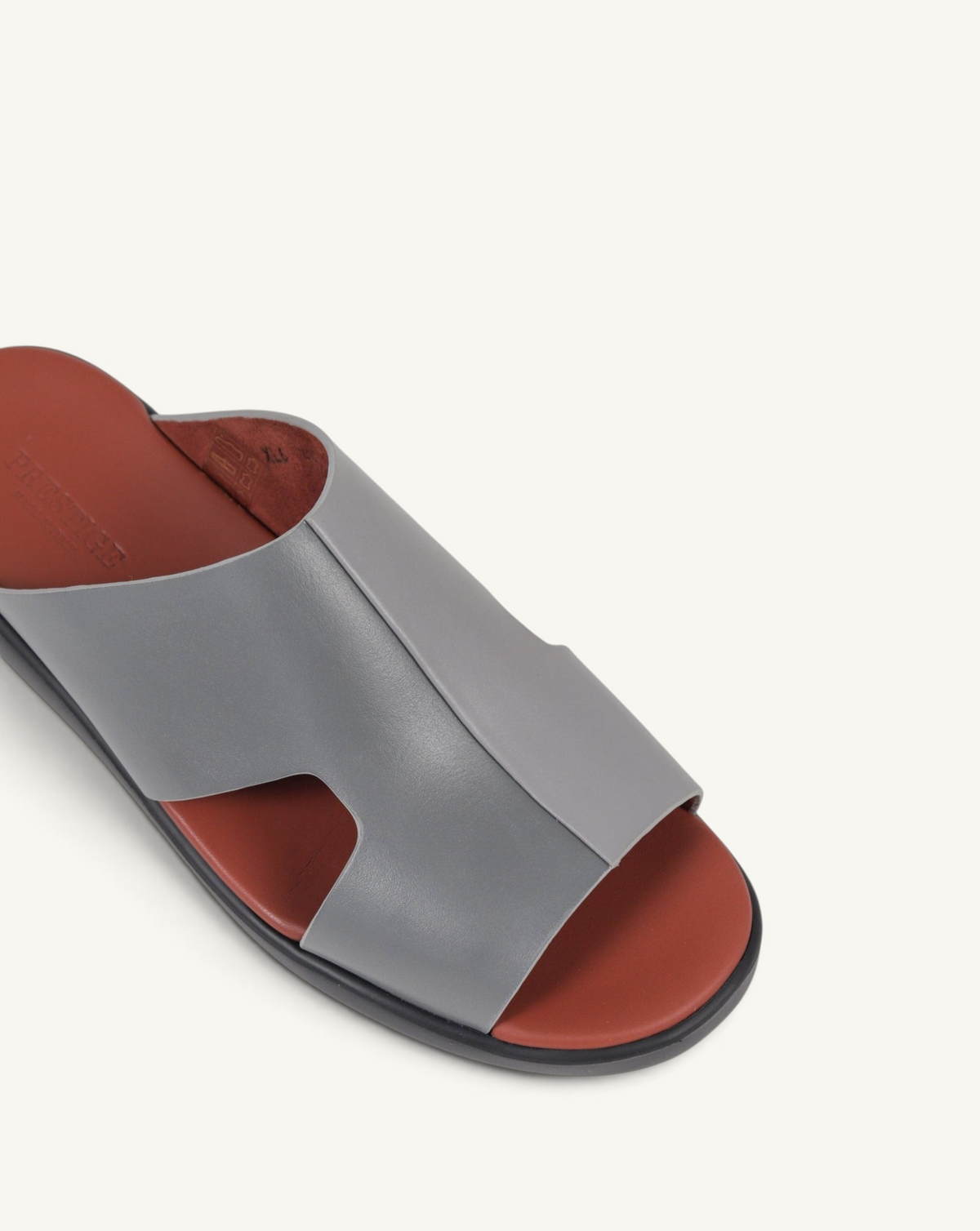 Prestige grey soft nappa calf leather slide sandal with a contrasting rust-coloured footbed