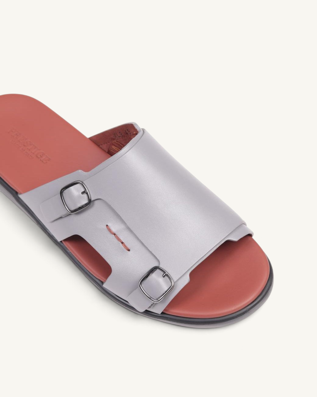 Prestige grey soft nappa calf leather slide sandals with double buckle straps and a contrasting terracotta footbed