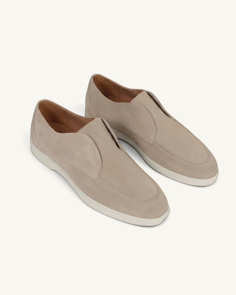 Prestige ivory velour loafers with a minimalist slip-on design and a clean white rubber sole.