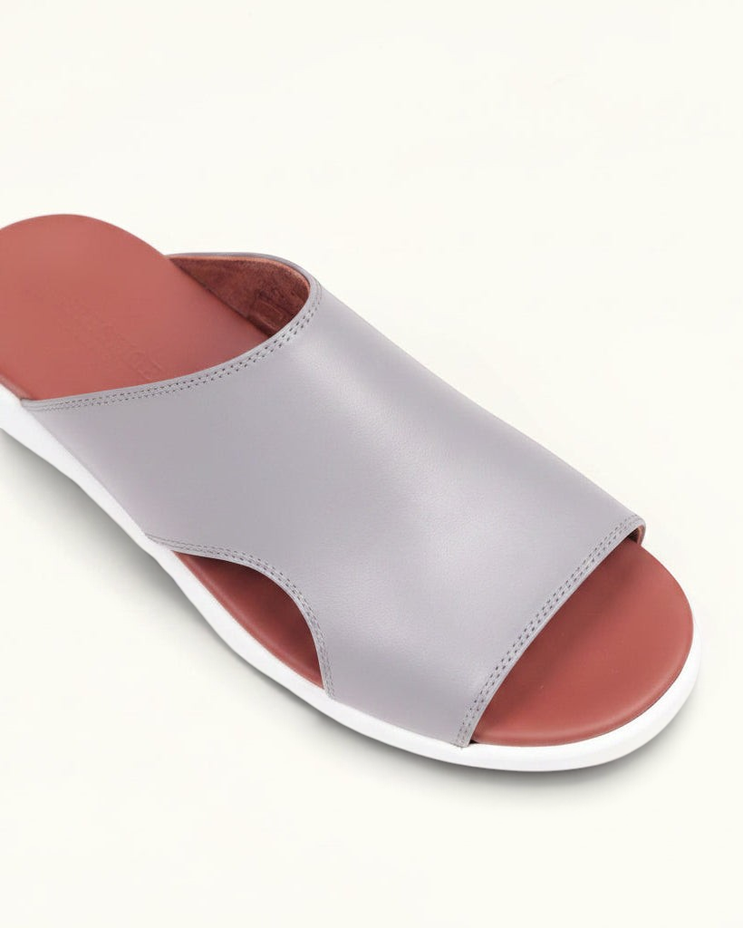 Prestige PSNC-XL12 light grey soft nappa leather slide sandal with a contrasting terracotta footbed and white sole.