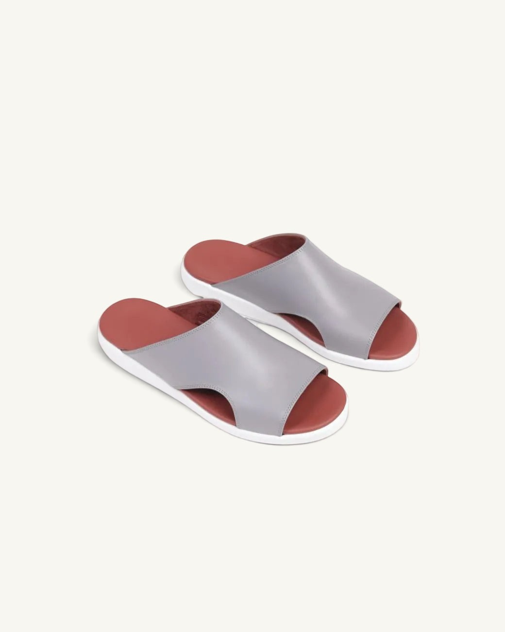 Prestige soft nappa leather slide sandals in light grey with a terracotta footbed and white sole