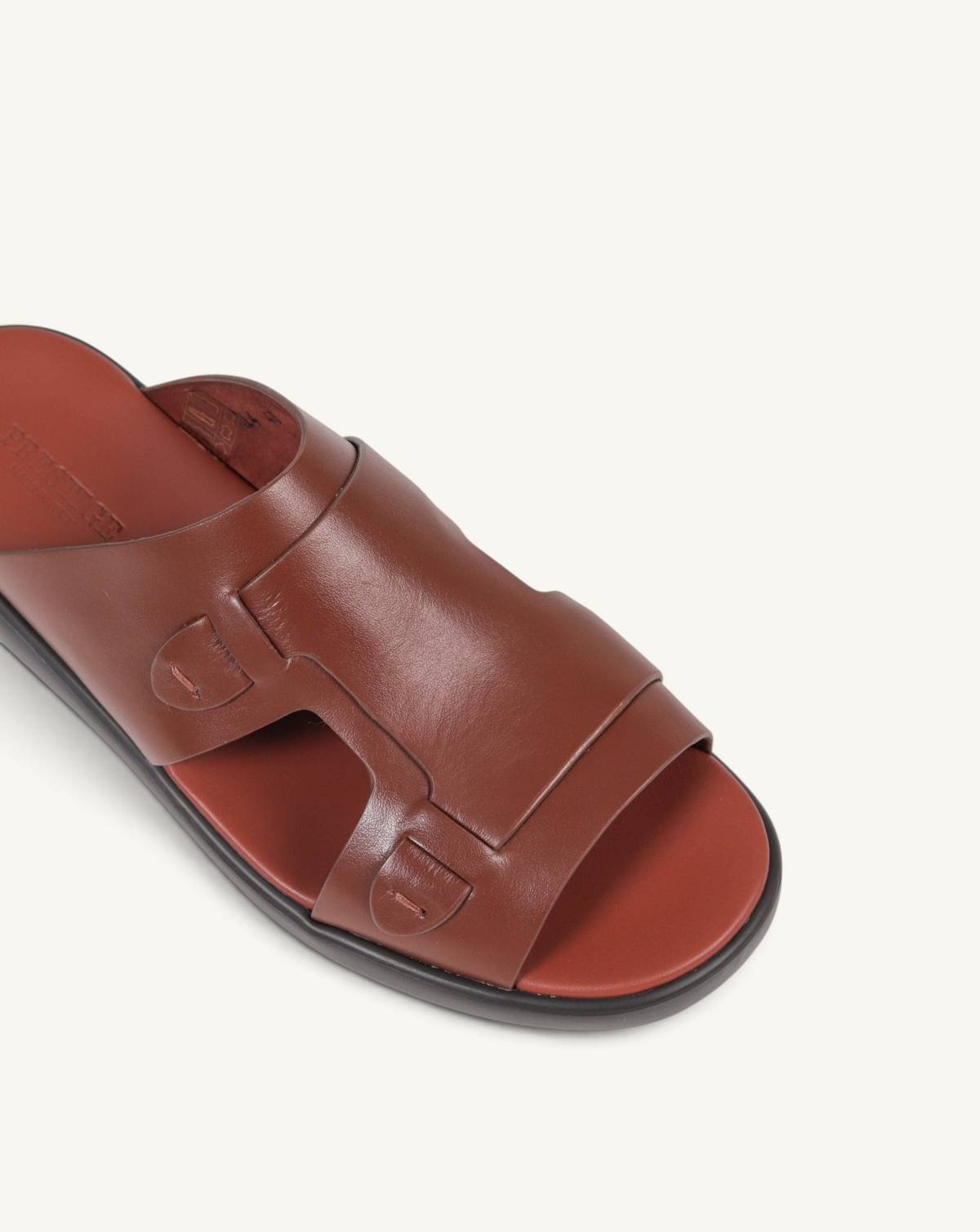 Prestige soft nappa leather slide sandals in mattone brown with a comfortable footbed and minimalist strap design.