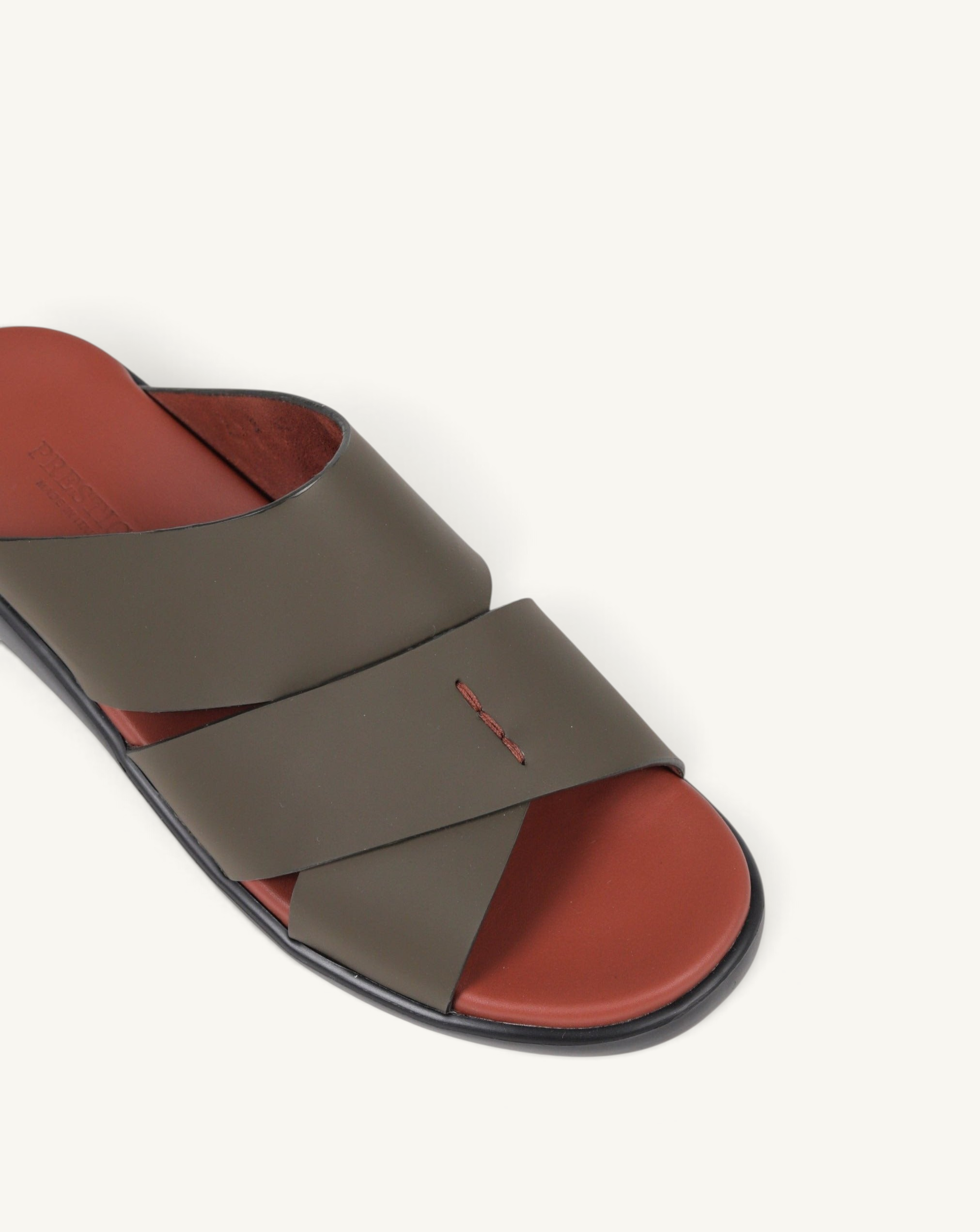 Prestige PG-XL3 Gommato military green leather slide sandals with a terracotta red footbed and cross-strap design.
