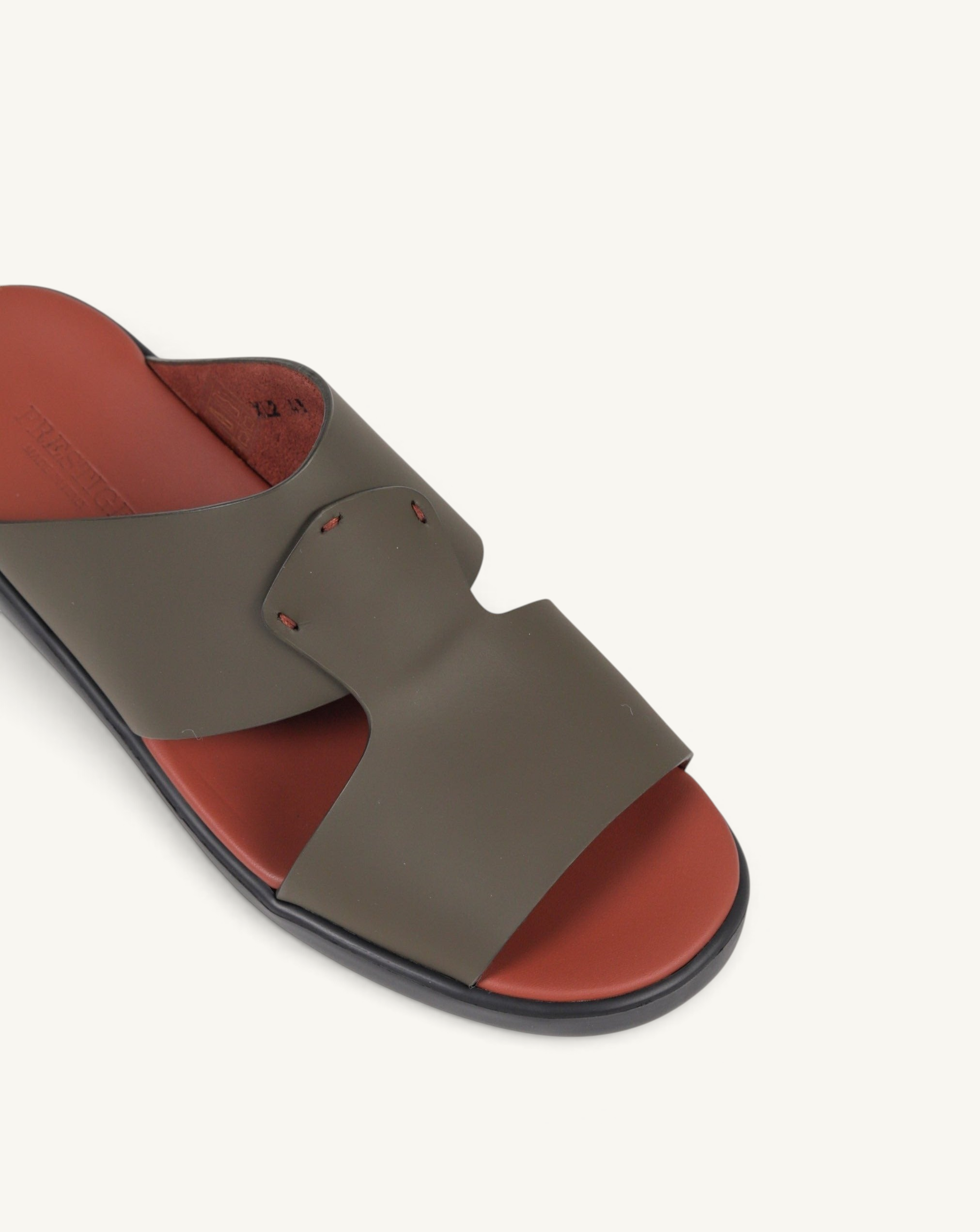 Prestige PG-XL2 Gomatto military green leather slide sandals with a contrasting red footbed and black sole.