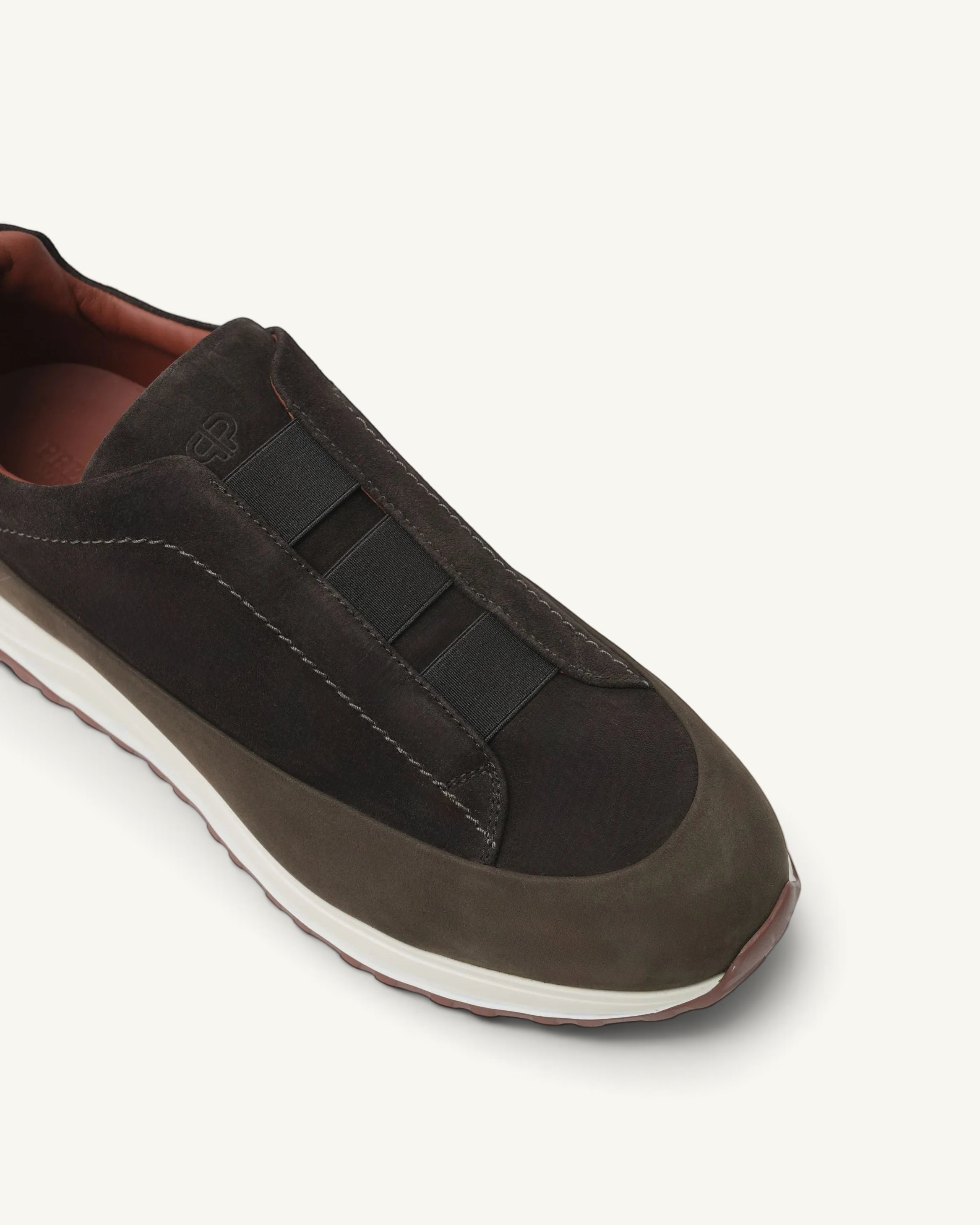 Prestige Monte triple stitch dark brown velour sneaker with elastic strap detail and white rubber sole