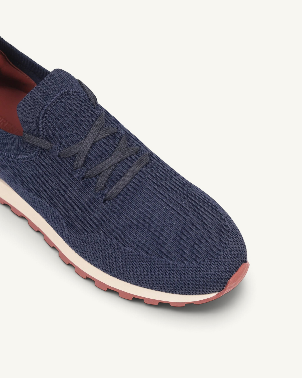 Prestige navy blue knit Flexy Lux runners with a textured upper and a contrasting beige and red rubber sole