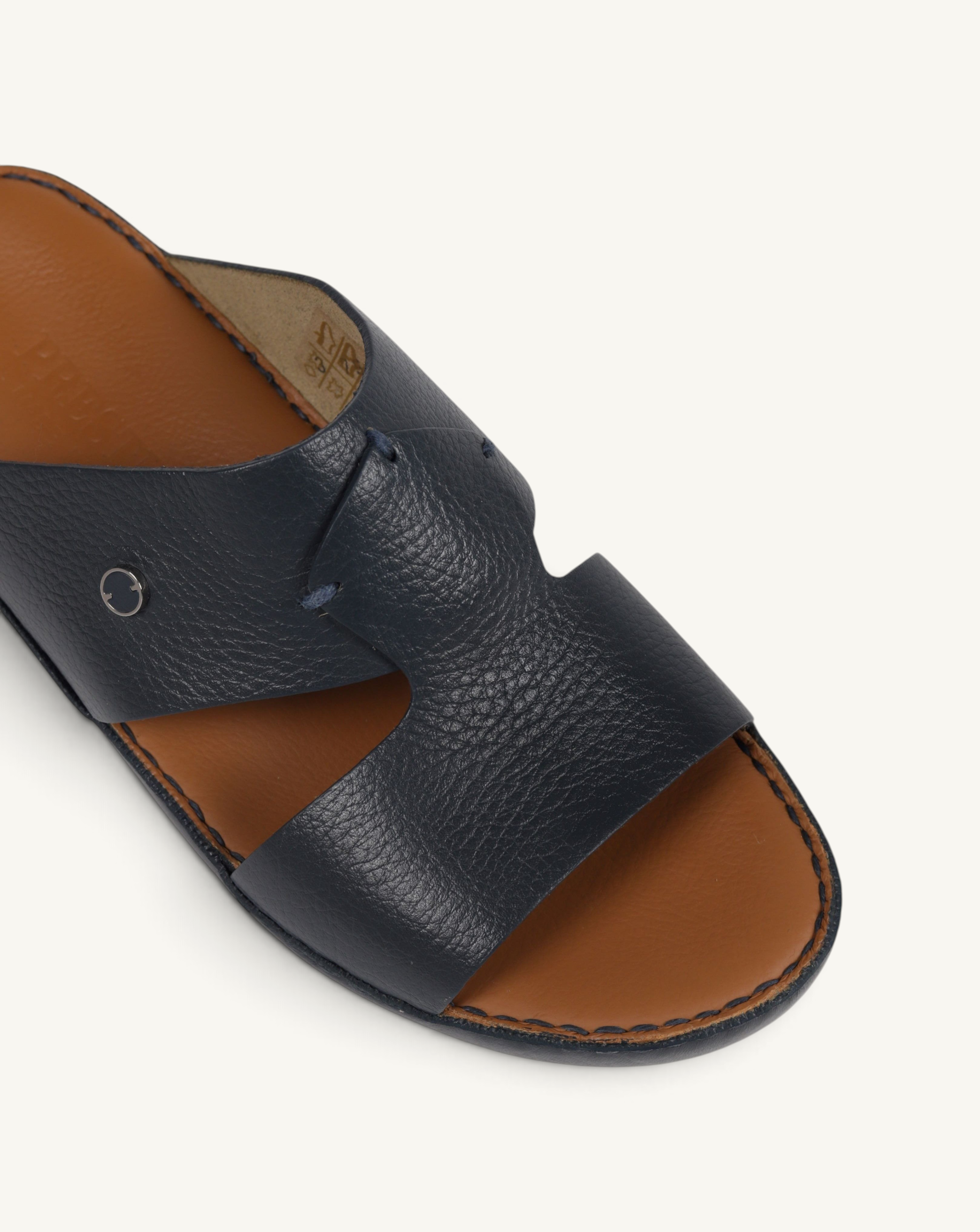 Prestige P3326 Legacy Trotter Aero navy blue leather slide sandals with a tan footbed and metallic logo detail
