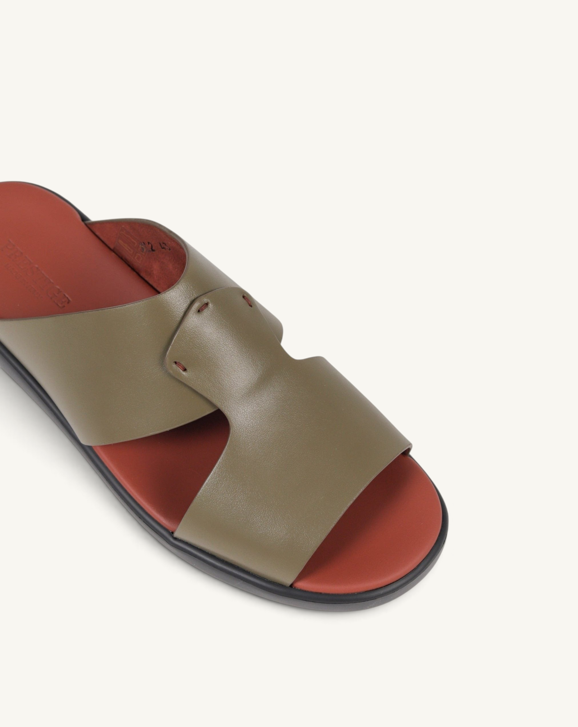 Prestige olive green soft nappa calf leather military-style slide sandal with a contrasting red footbed