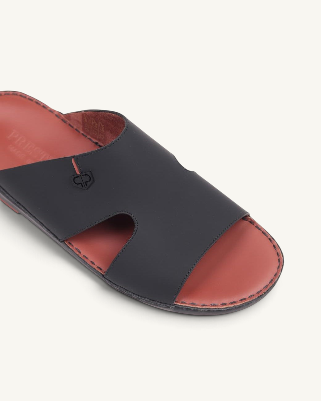 Prestige P3364 Elite Lux slide sandal in matt black leather with a tan footbed and embossed logo detail