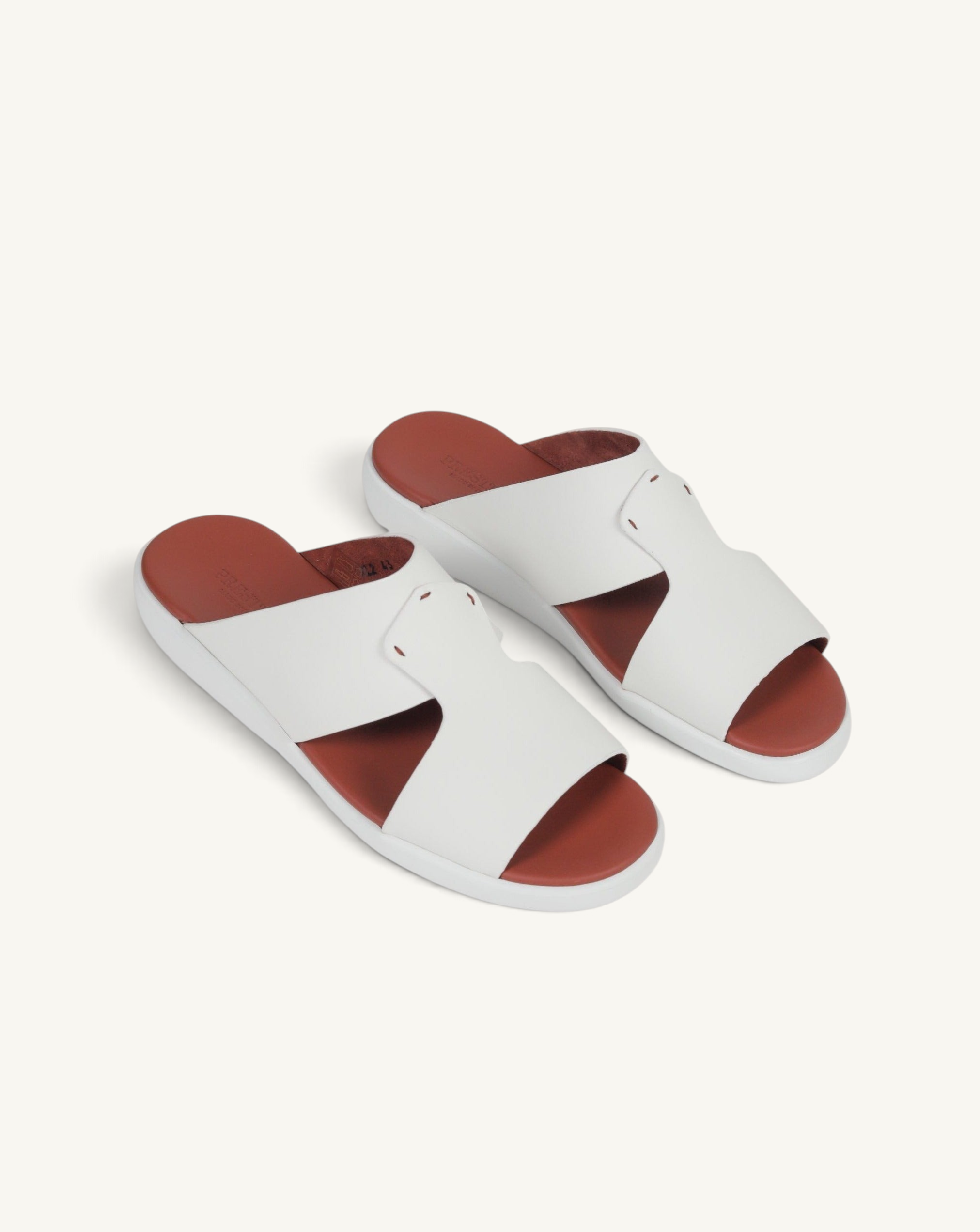 Prestige PG-XL2 Gommato white slide sandals with a smooth white leather upper and a contrasting terracotta footbed.