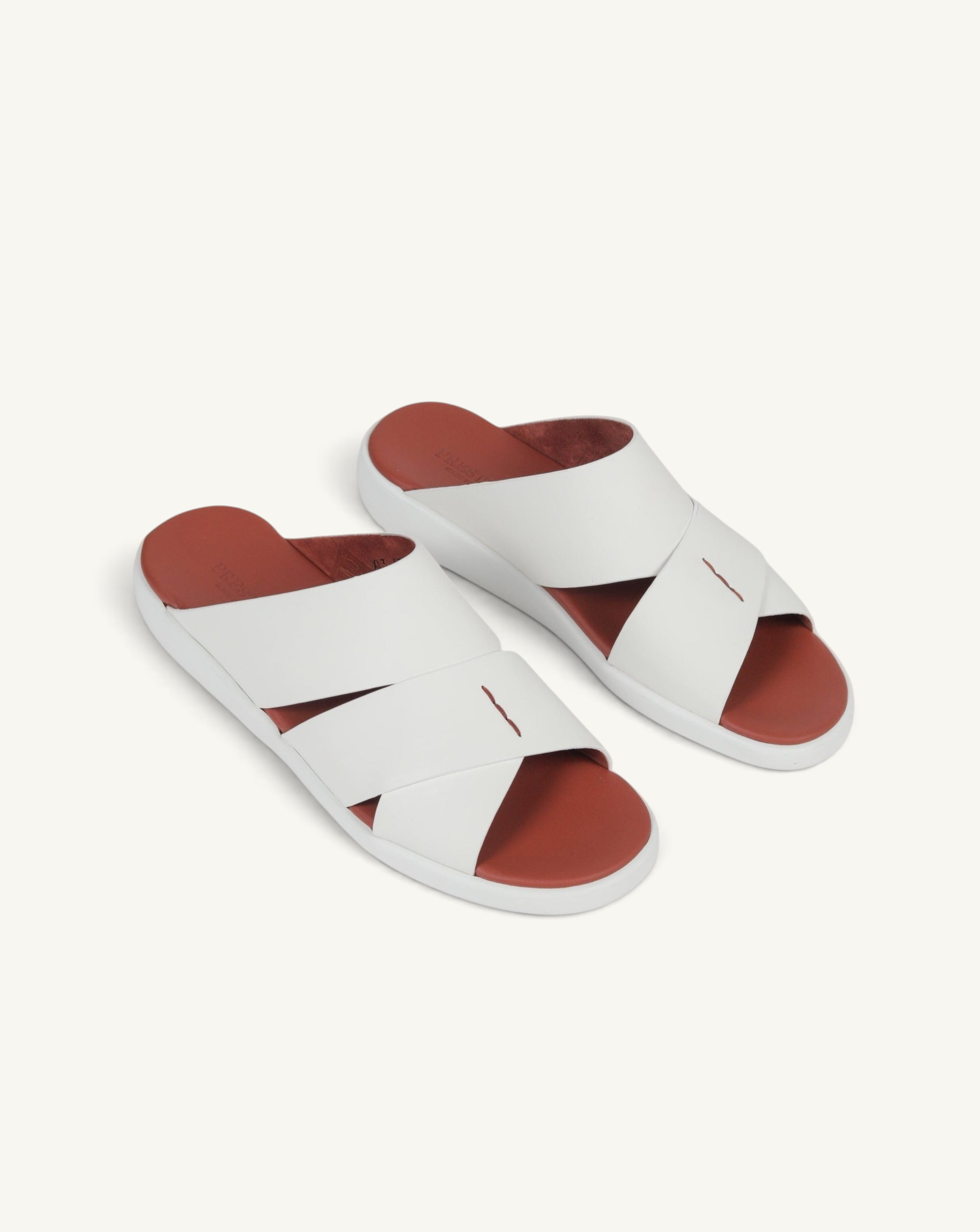 Prestige PG-XL3 Gommato white slide sandals featuring a crisscross strap design and a contrasting terracotta footbed.