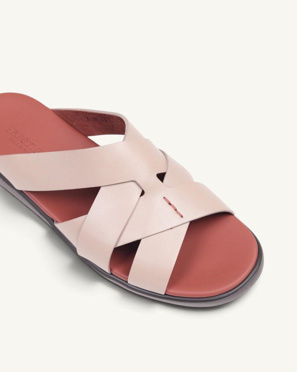 Prestige taupe soft nappa calf leather slide sandals with crisscross straps and a contrasting dark red footbed