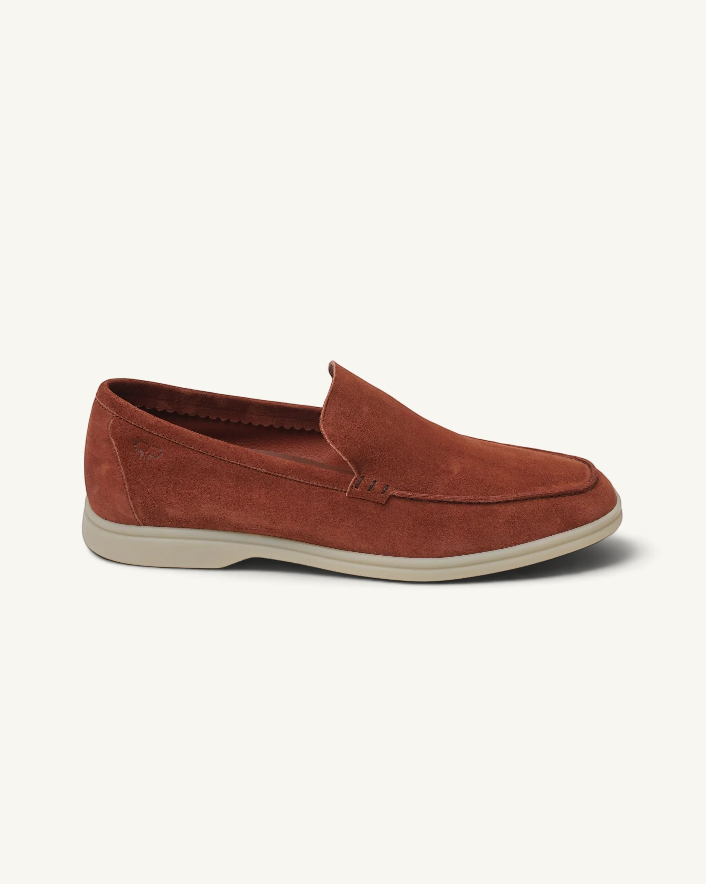 Prestige whisky brown suede loafer with a comfortable flat beige sole and minimalist slip-on design