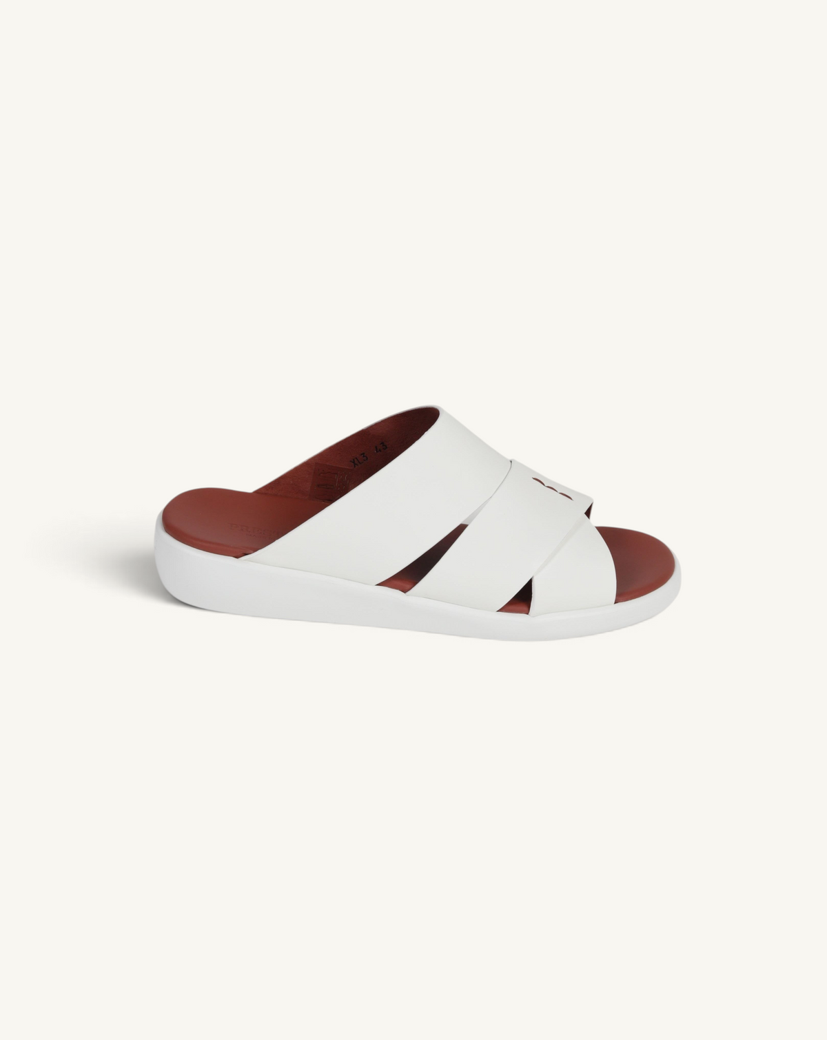 Prestige white soft nappa calf leather slide sandal with a comfortable brown footbed and thick white sole