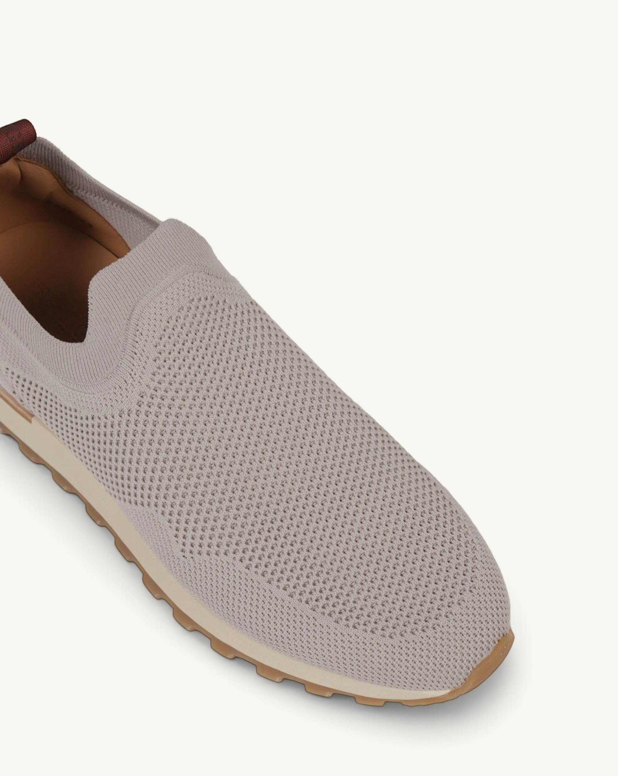 Prestige PS-U5315 Runners Flexy active beige slip-on sneakers featuring a breathable knit upper and rubber sole.