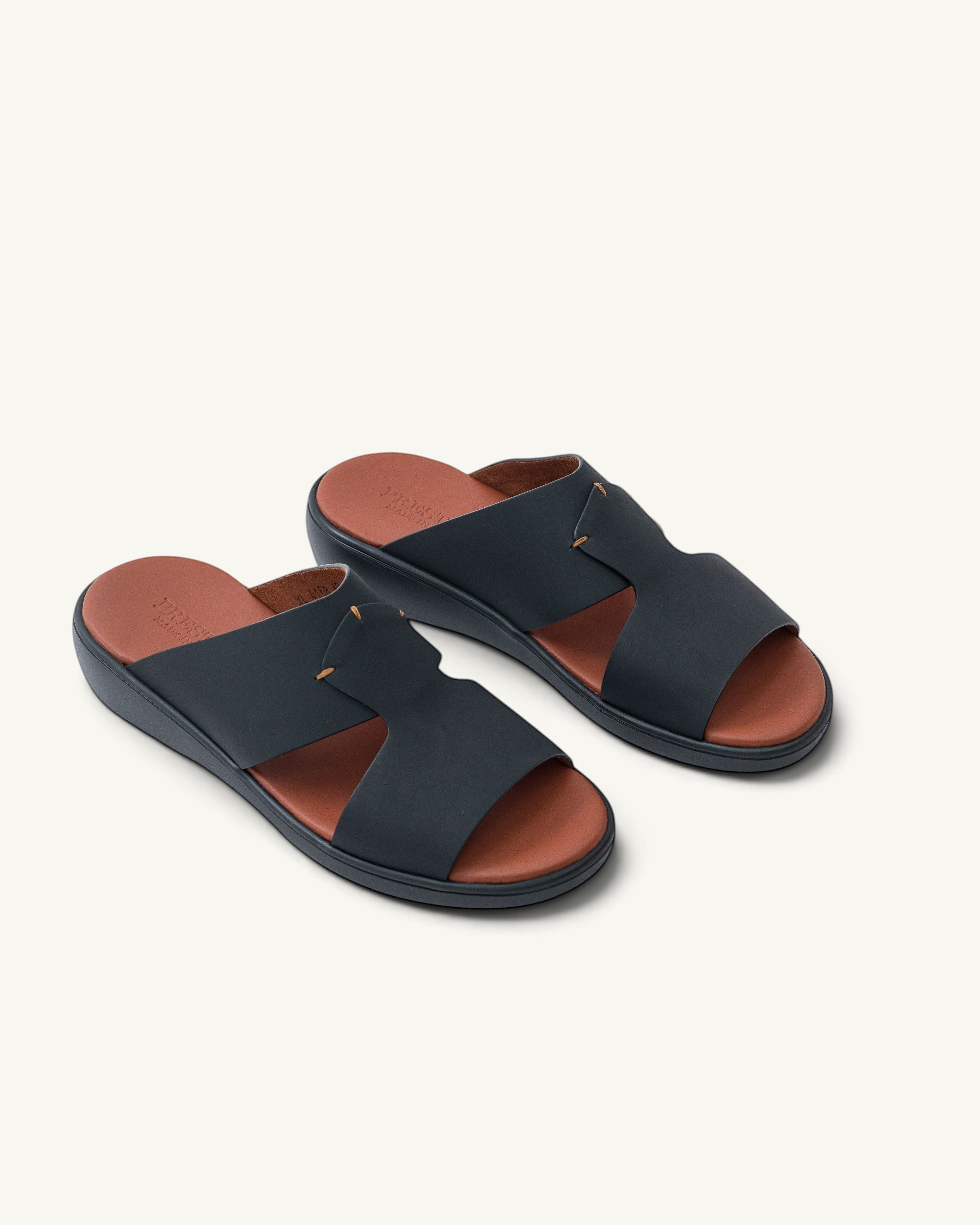 Prestige XL Classic sandals in black gommato leather with a tan footbed and comfortable wedge sole