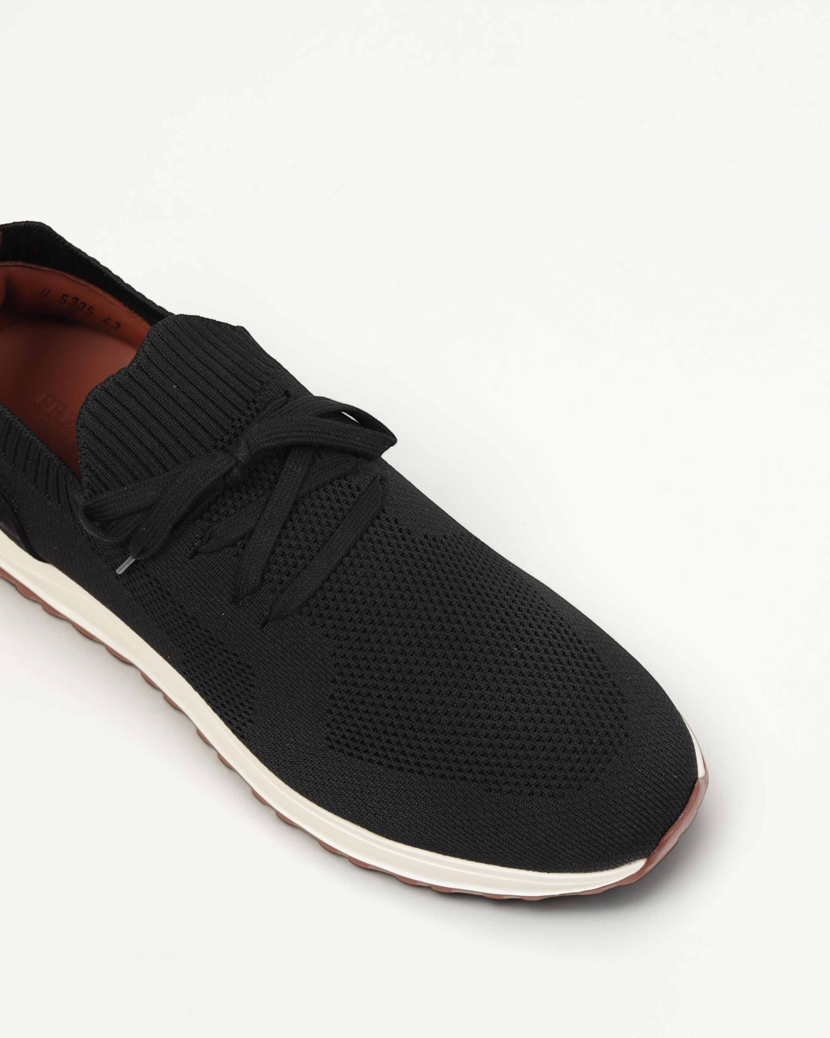 Prestige XLR Fame Walk XL Lux black knit sneaker with a white midsole and brown outsole, top-down view.