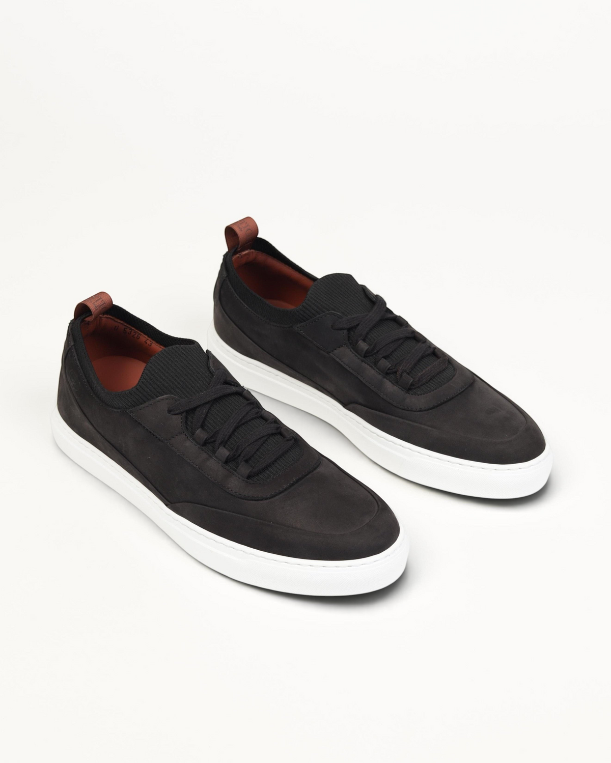 Prestige U5326 Soho Nabuk lightweight sneakers in black with a white rubber sole and brown heel pull tab