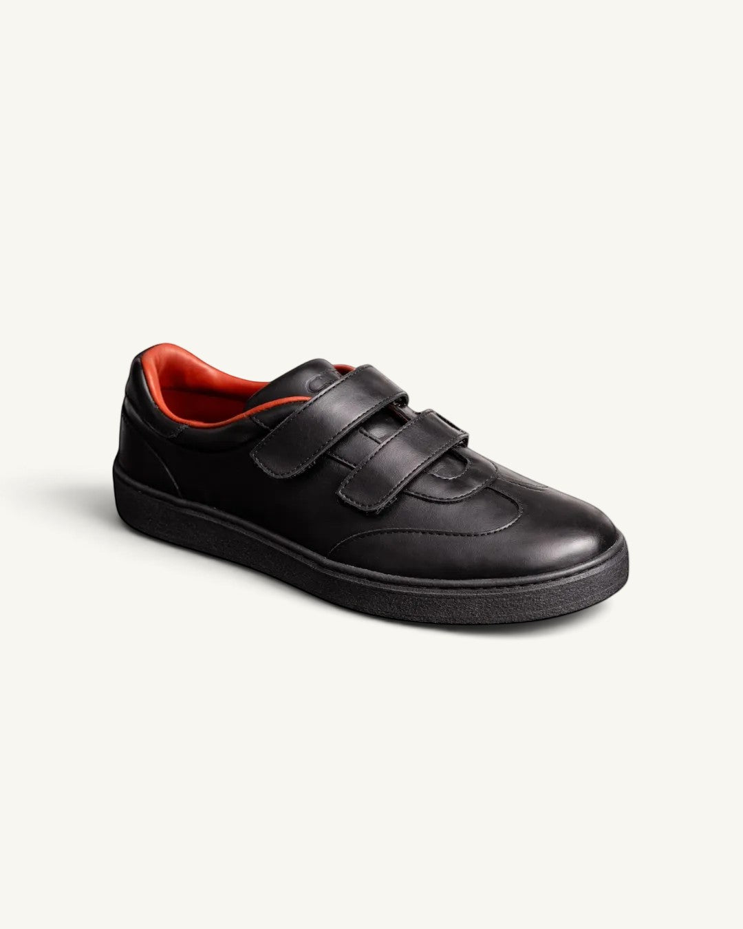 Prestige Kid’s Tennis Walk unisex sneakers in black nappa calf leather with double velcro straps and orange lining