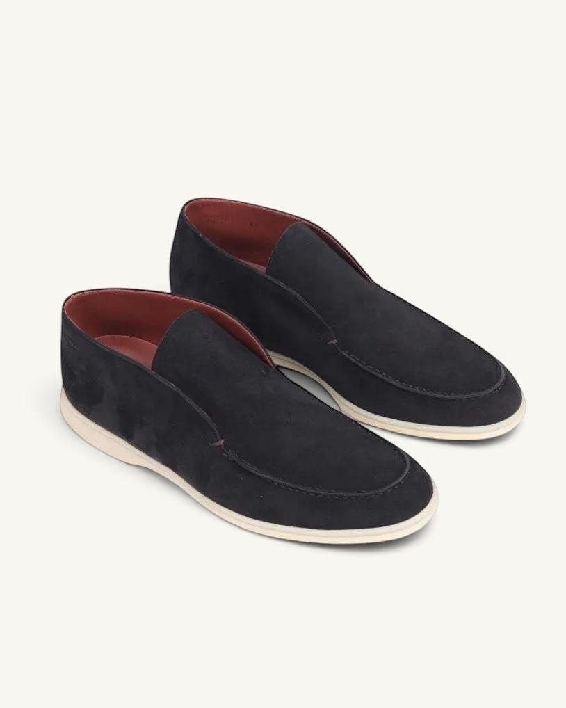 Prestige black suede ankle boots with a slip-on design and contrasting white rubber sole