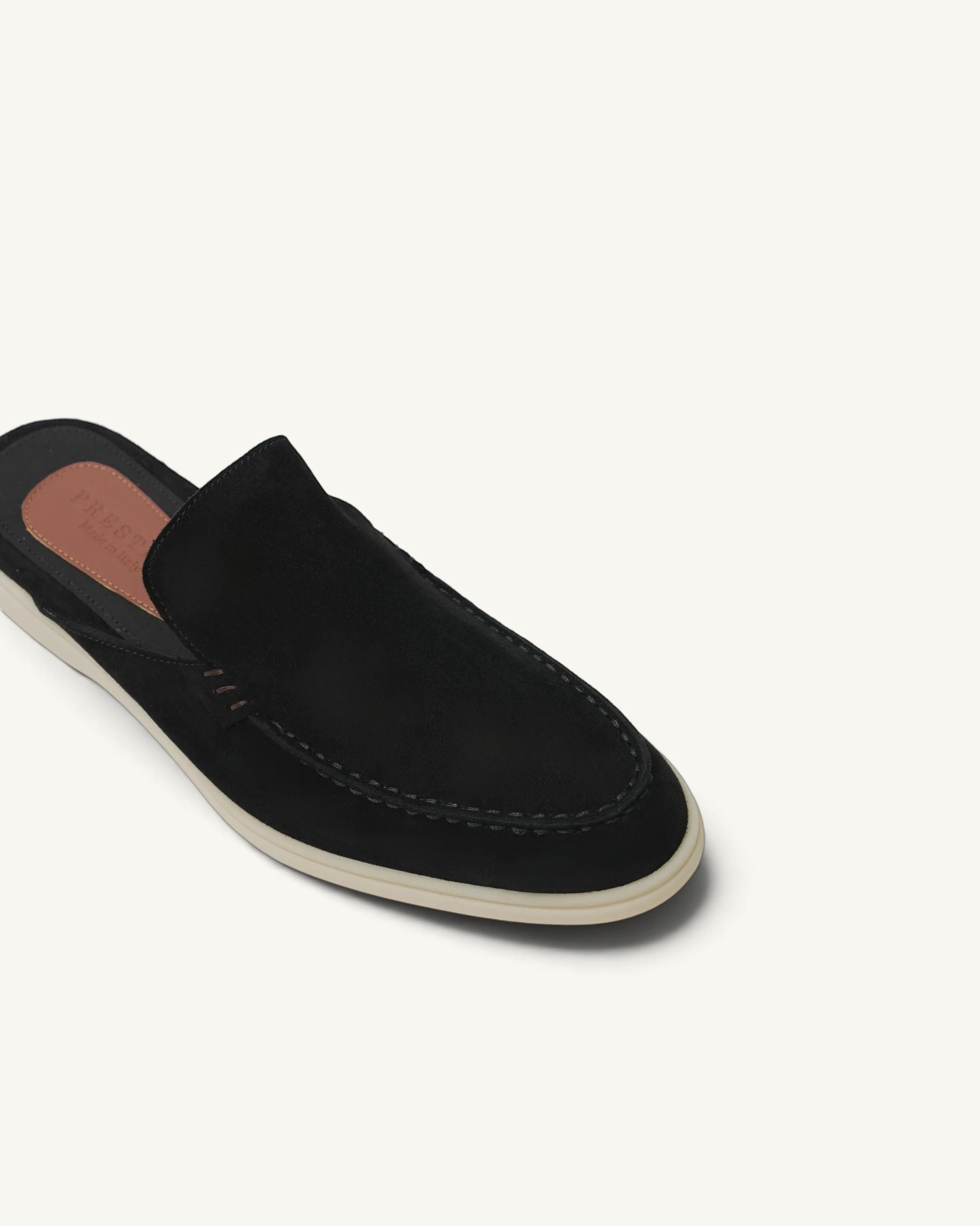 Prestige black suede babouche summer walk slip-on shoe with a white rubber sole and tan leather insole.