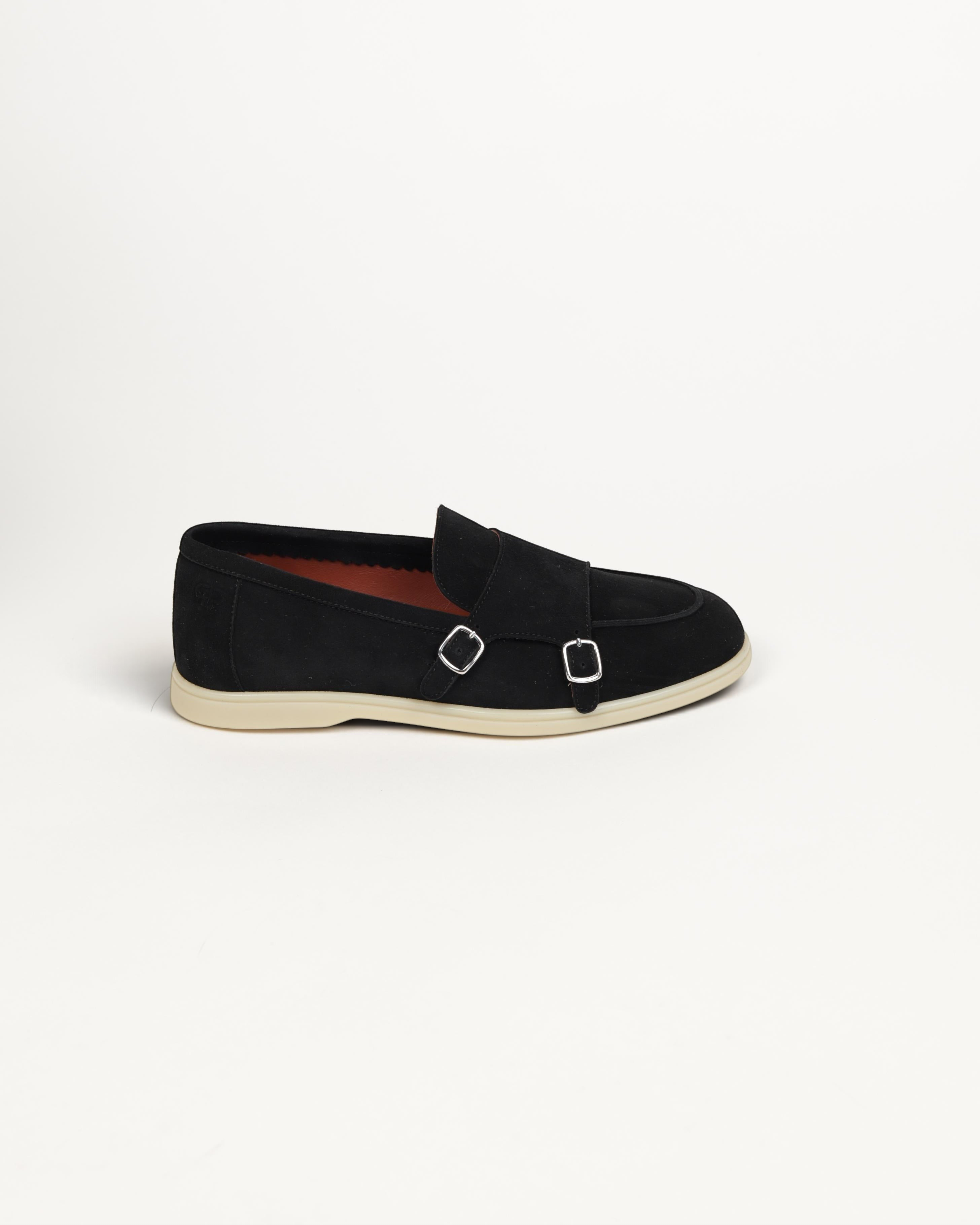Prestige black velour monk strap loafer with silver double buckles and a contrasting cream rubber sole.