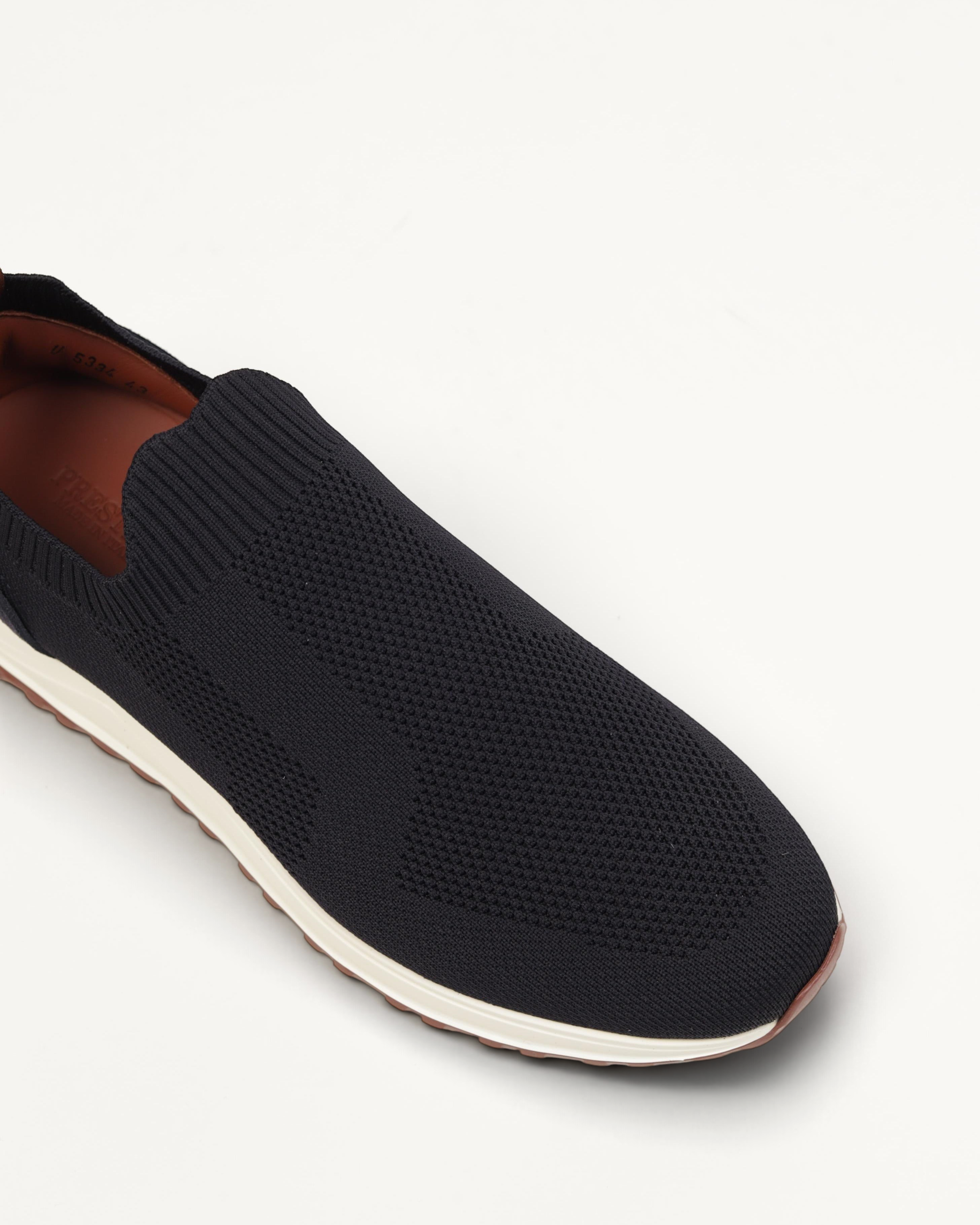 Prestige XLR Fame Active XL Lux blue slip-on sneaker featuring a breathable knit upper and white cushioned sole.