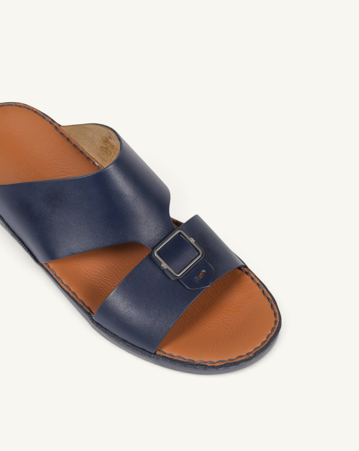 Prestige P1493 Legacy NC blue leather slide sandals with a silver buckle and tan leather footbed.