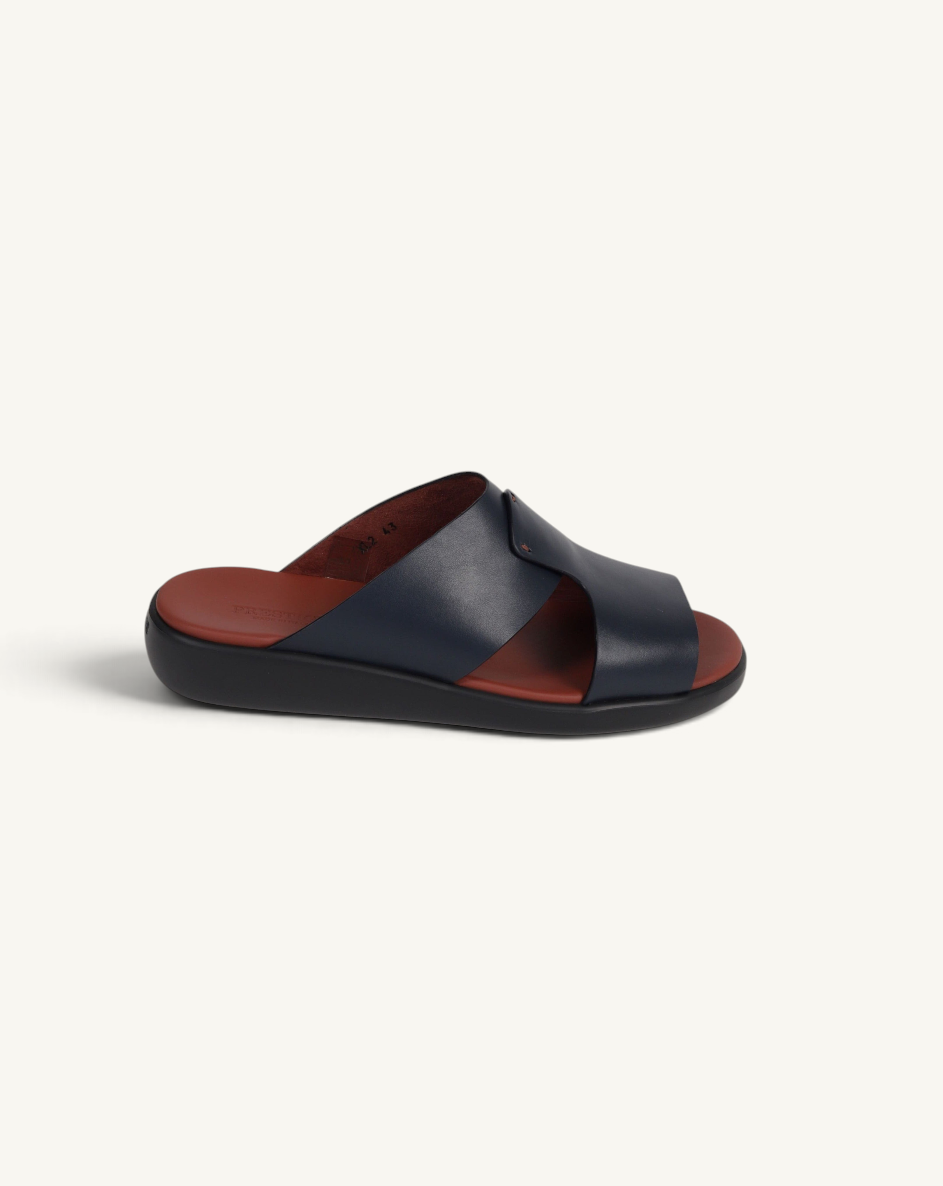 Prestige PSNC-XL2 slide sandal in blue soft nappa calf leather with a contrasting brown footbed and black sole.