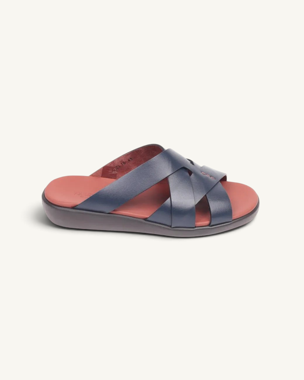Prestige blue soft nappa calf leather slide sandals with a comfortable red footbed and crisscross strap design.