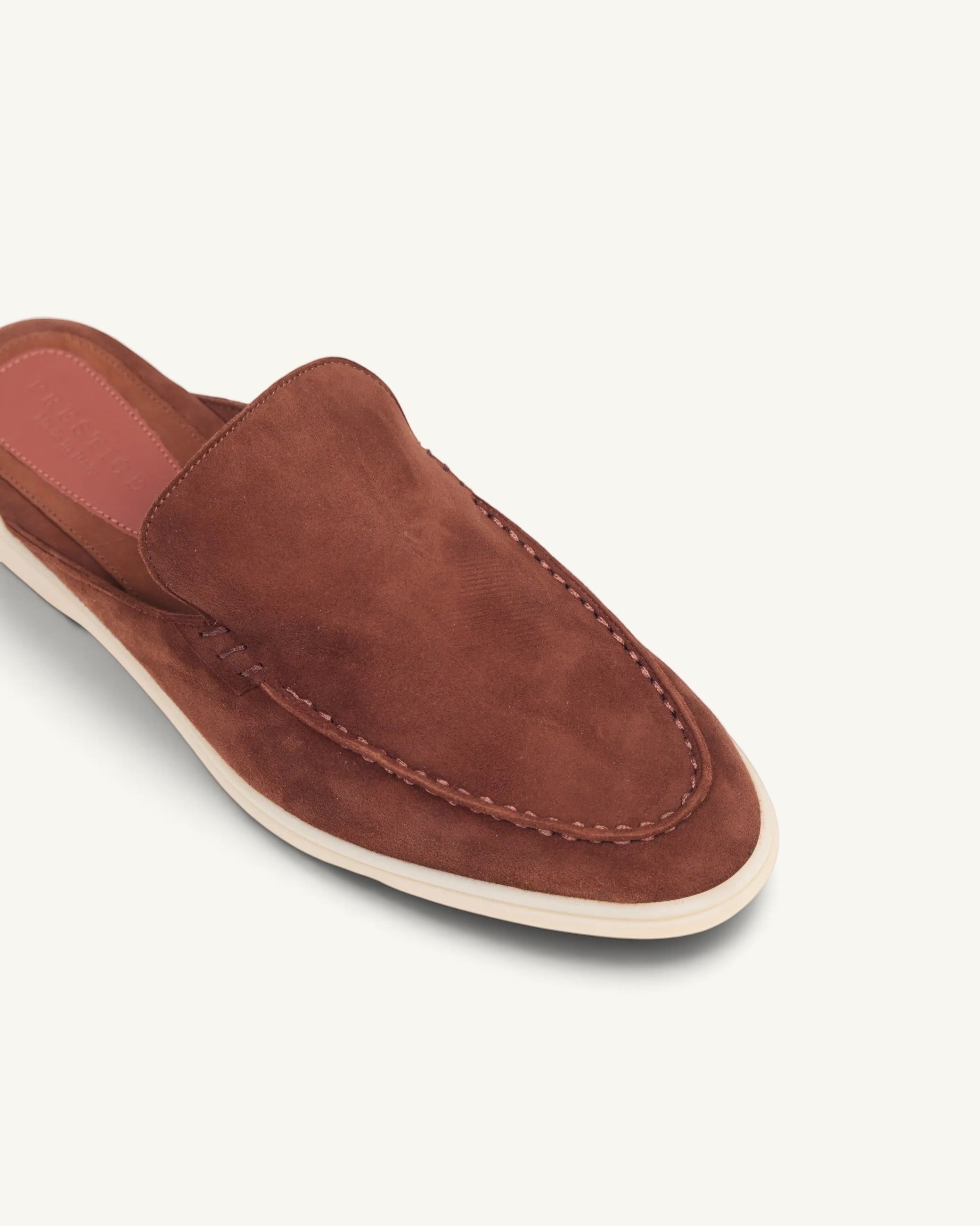 Prestige brown suede babouche summer walk slip-on shoe with a white rubber sole and moccasin-style stitching
