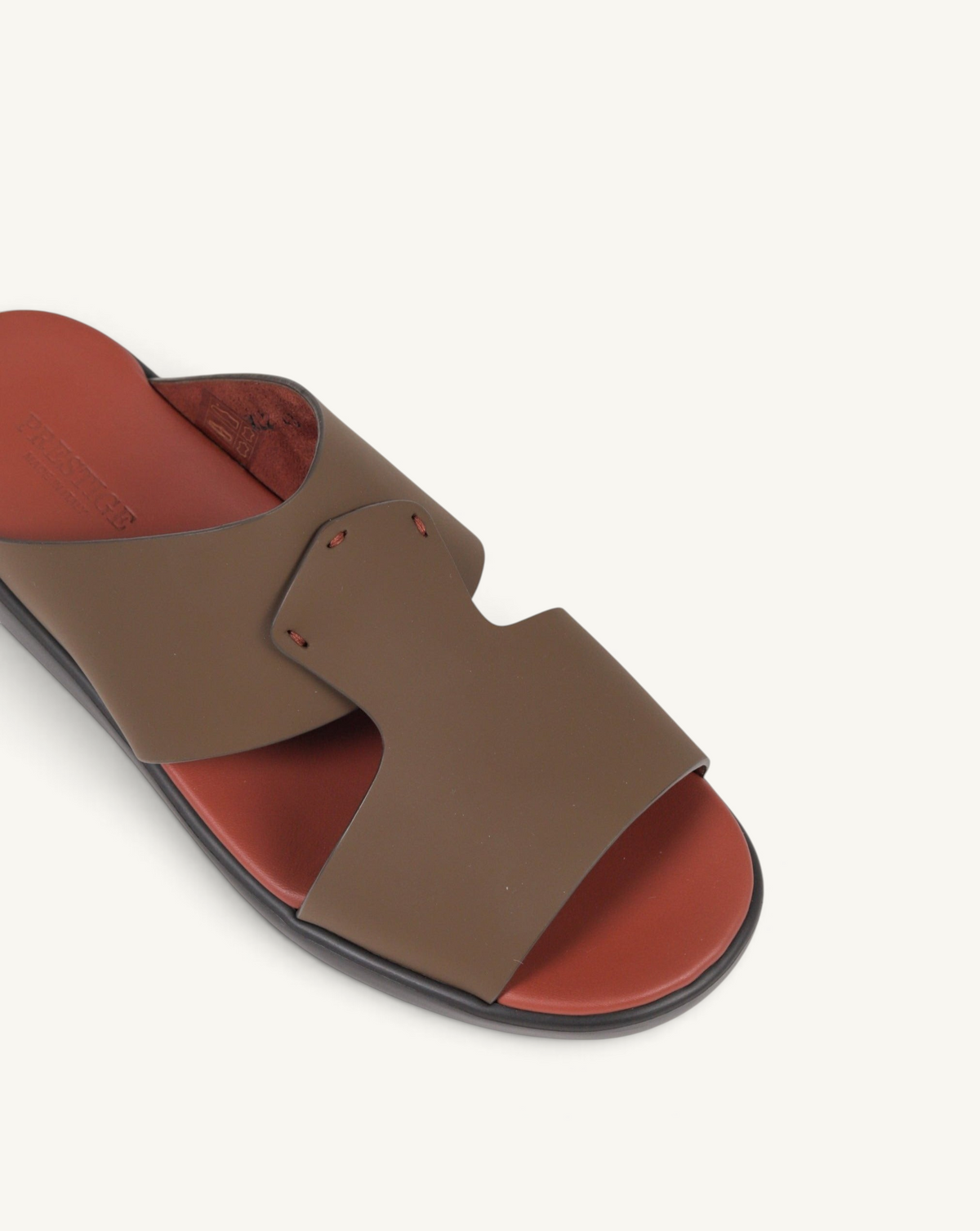Prestige PG-XL2 slide sandals in copper brown rubberized material with a comfortable red leather footbed.