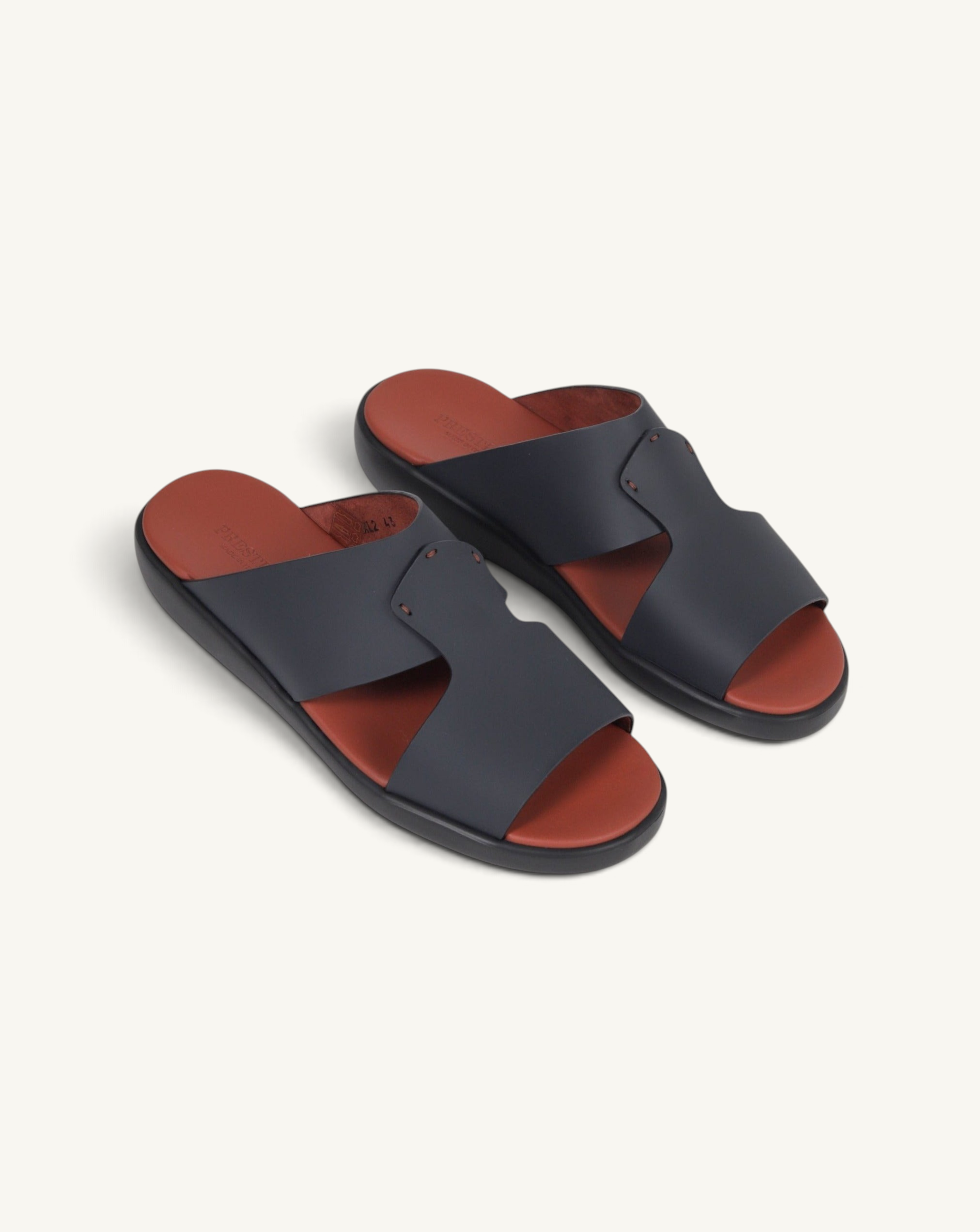Prestige PG-XL2 slide sandals in dark blue gommato leather with a contrasting tan footbed and black sole